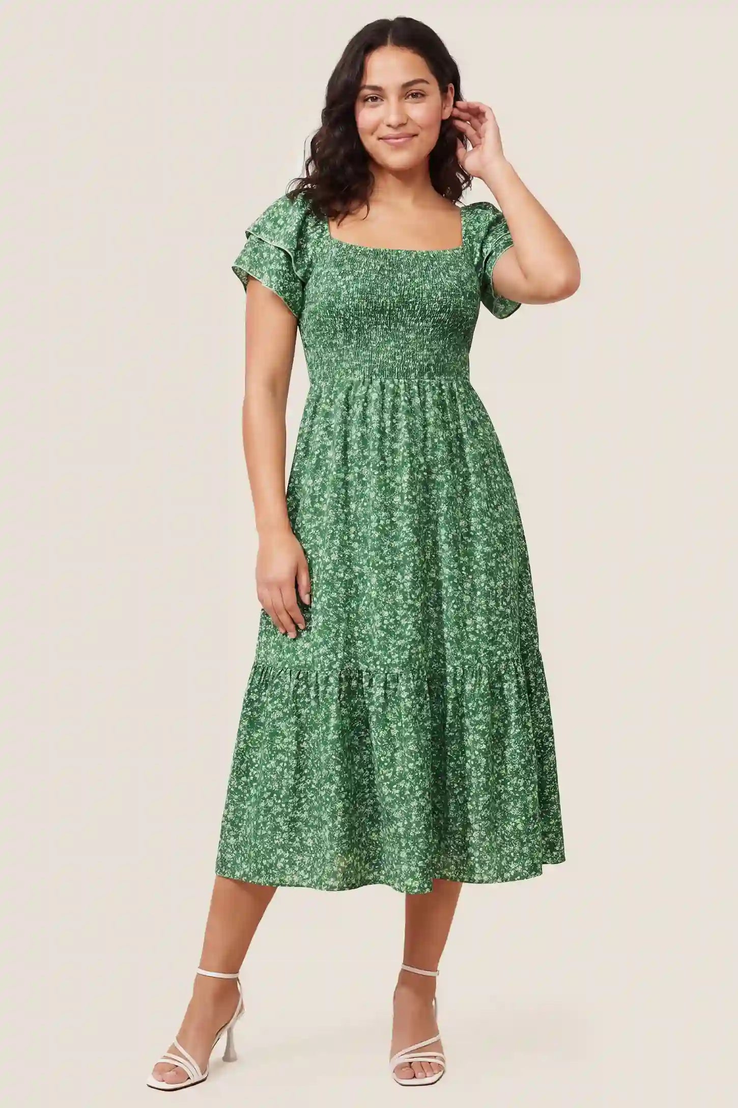 Floral Smocked Square Neck Tiered Maternity Midi Dress Floral Smocked Square Neck Tiered Maternity Midi Dress in Peacock Green with a smocked tiered design, front view on a non pregnant model.