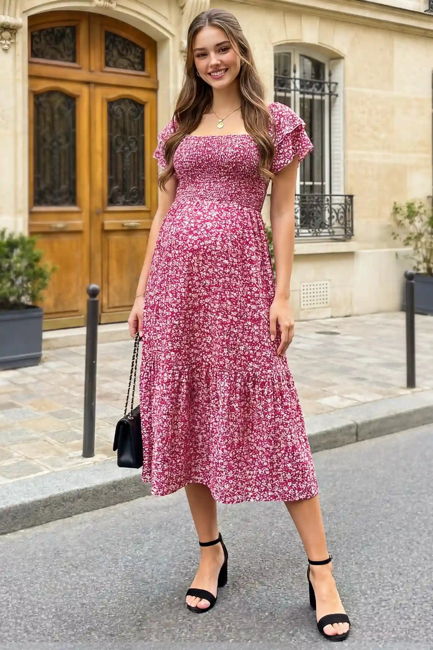 Floral Smocked Square Neck Tiered Maternity Midi Dress Floral Smocked Square Neck Tiered Maternity Midi Dress in Rose Red with flowing ruffled layers, UGC view on a  pregnant model.