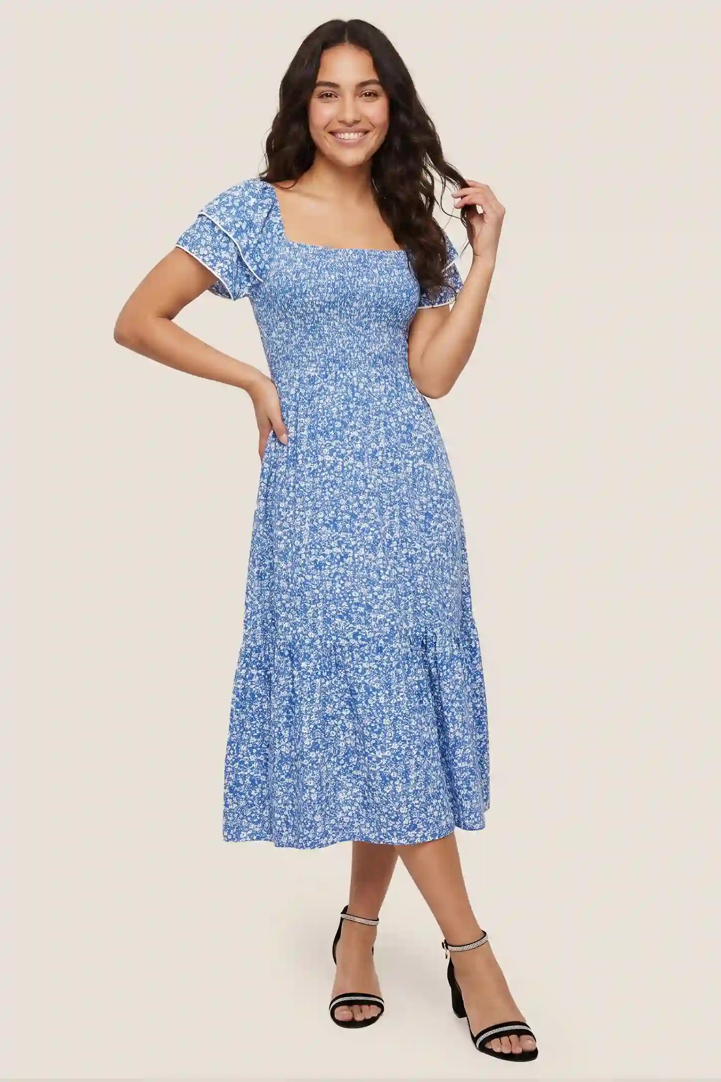 Floral Smocked Square Neck Tiered Maternity Midi Dress Floral Smocked Square Neck Tiered Maternity Midi Dress in Royal Blue with a smocked tiered design, front view on a non pregnant model.