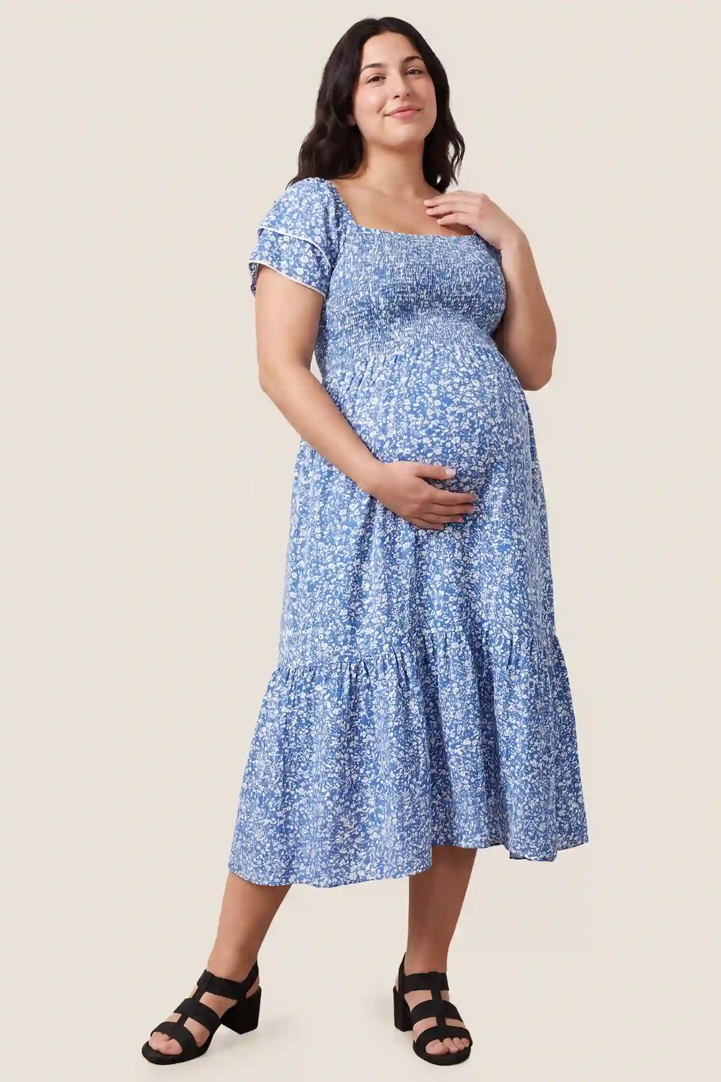 Floral Smocked Square Neck Tiered Maternity Midi Dress Floral Smocked Square Neck Tiered Maternity Midi Dress in Royal Blue with a smocked tiered design, front view on a plus-size model.