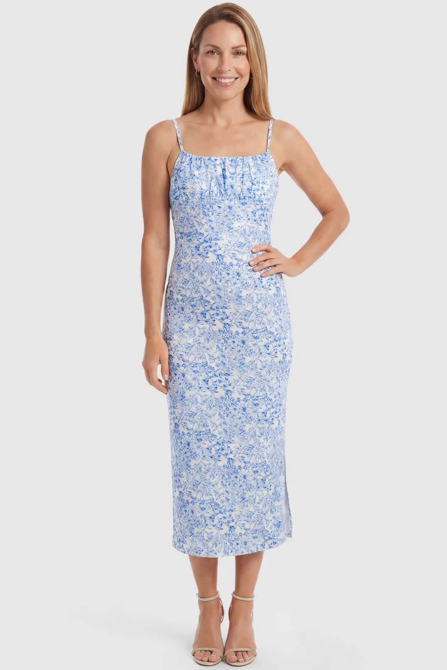 Floral Square Neck Side Ruched Maternity Midi Dress Floral Square Neck Side Ruched Maternity Midi Dress in Blue featuring a botanical print and sleeveless cut on a postpartum model, front view.