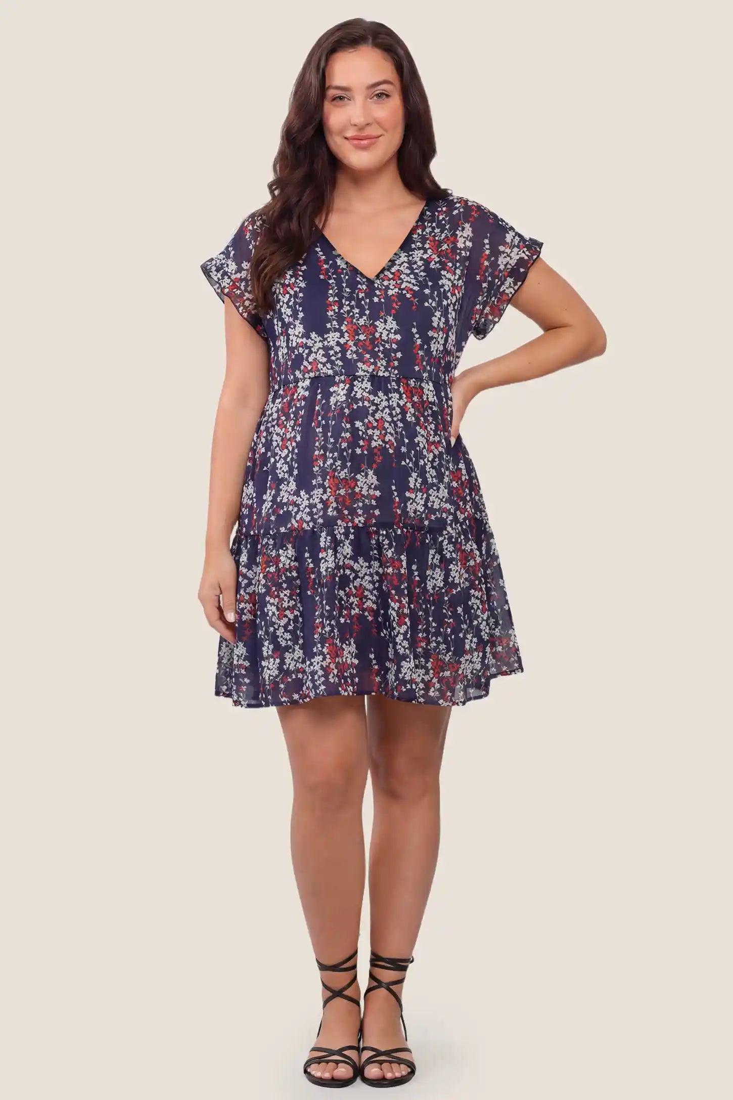 Floral V-Neck A-Line Flutter Sleeve Short Maternity Dress Floral V-Neck A-Line Flutter Sleeve Short Maternity Dress in Navy Blue with feminine short design, front view on a plus-size model.