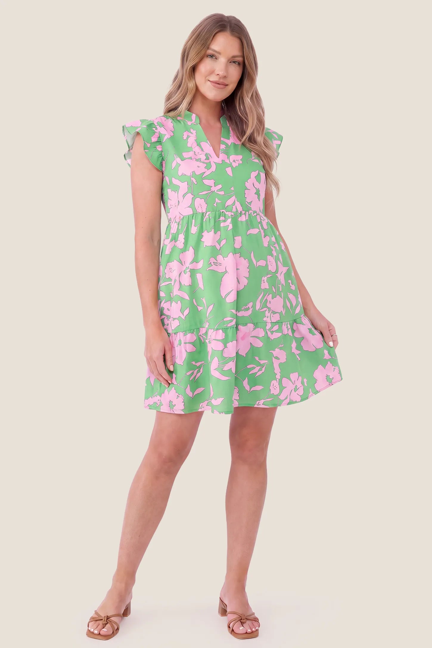 Floral Print V-Neck Flutter Sleeve Maternity Short Dress Floral Print V-Neck Flutter Sleeve Maternity Short Dress in Green with a clean front view showcasing the V-neckline on a pregnant model.