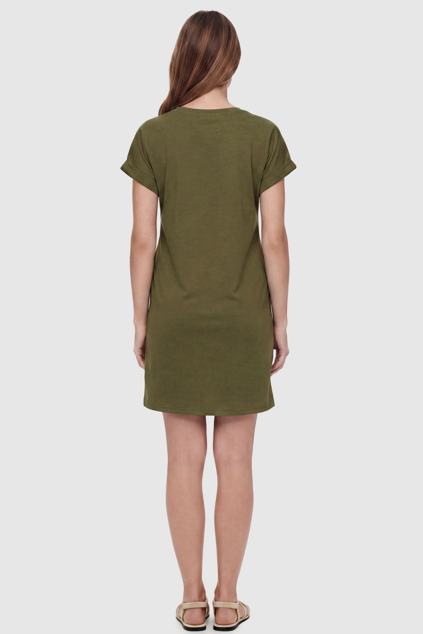 Flowy Pocket Tunic Maternity T-Shirt Dress Flowy Pocket Tunic Maternity T-Shirt Dress in Army Green featuring a classic crew neckline on a back-view model.