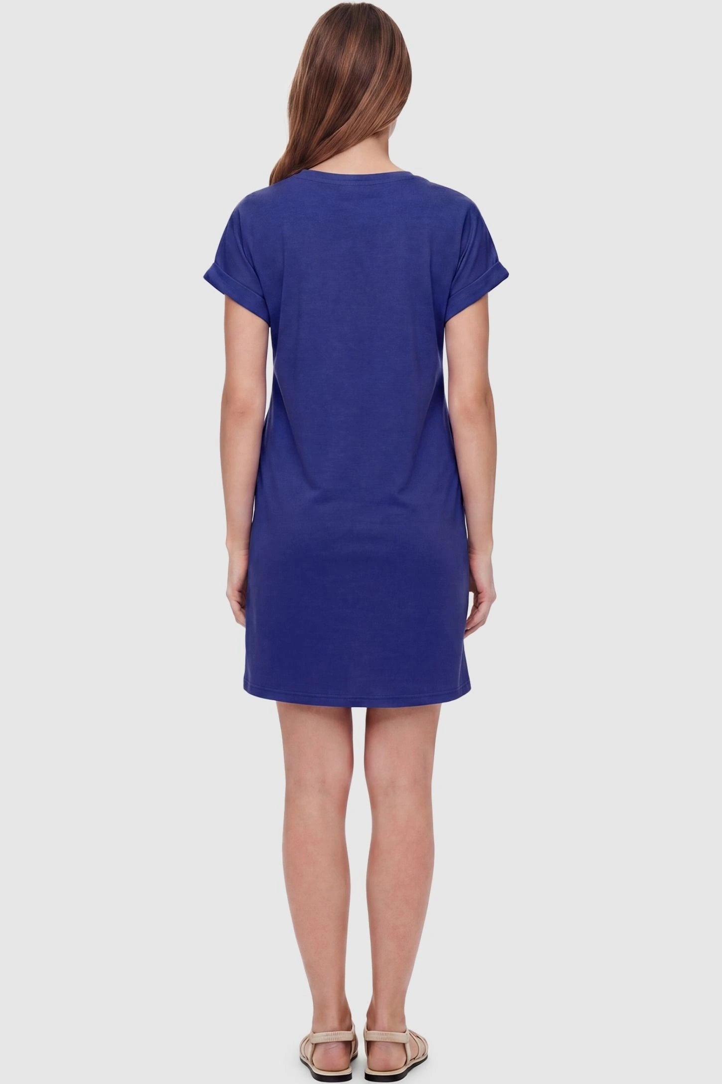 Flowy Pocket Tunic Maternity T-Shirt Dress Flowy Pocket Tunic Maternity T-Shirt Dress in Blue featuring a classic crew neckline on a back-view model.