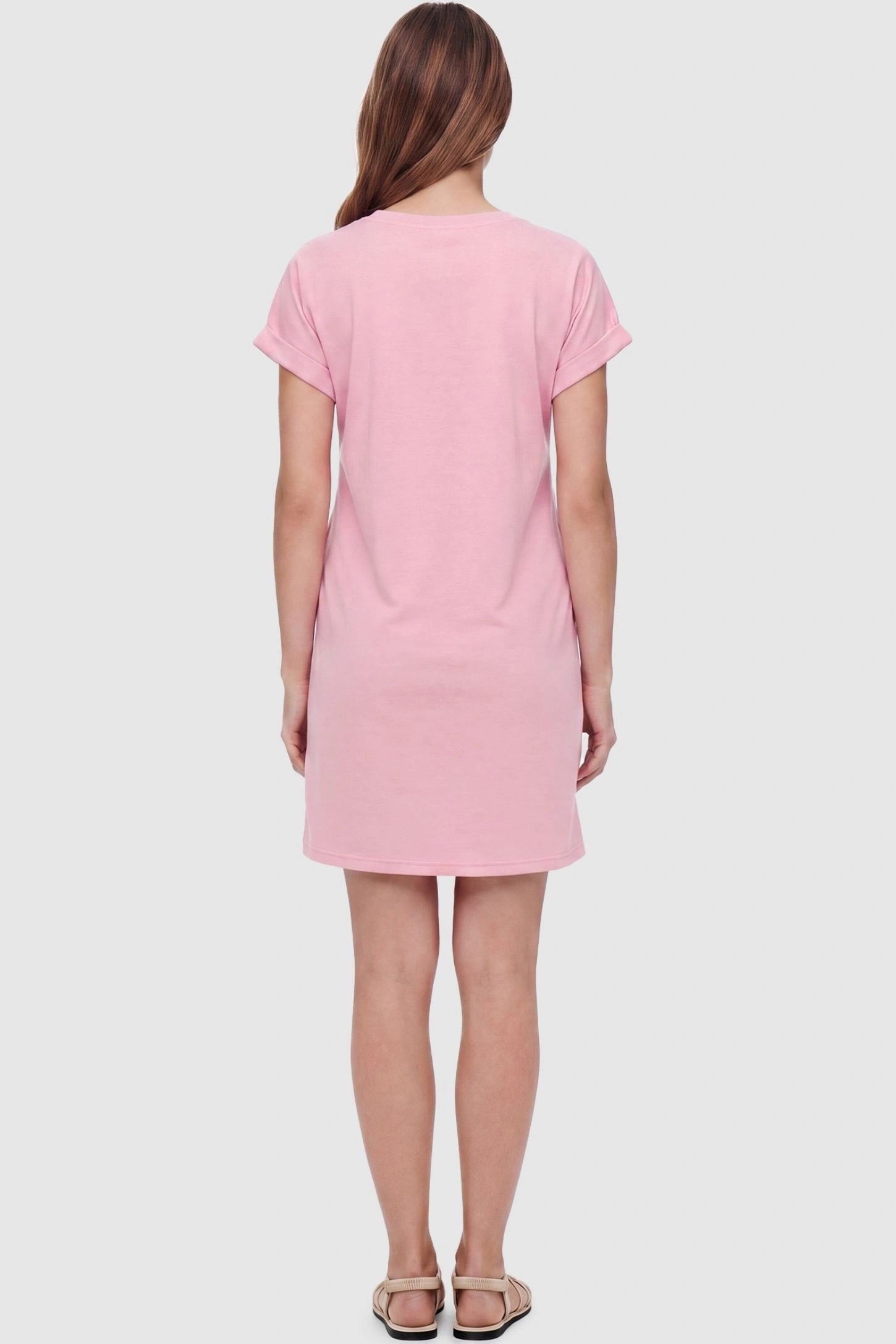 Flowy Pocket Tunic Maternity T-Shirt Dress Flowy Pocket Tunic Maternity T-Shirt Dress in Pink featuring a classic crew neckline on a back-view model.