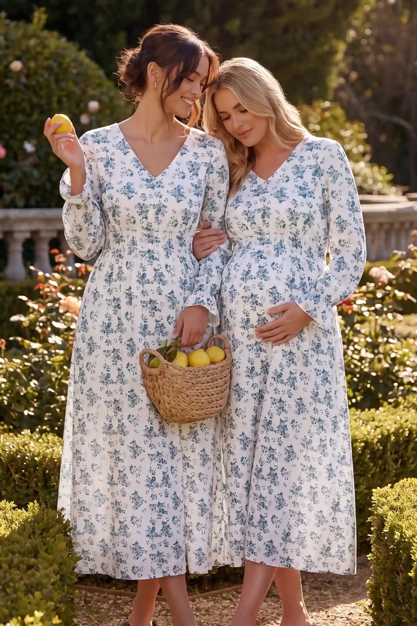 French Blue Floral V-Neck Maternity Dress French Blue Floral V-Neck Maternity Dress in French Blue Floral with vintage print, front lifestyle view on a pregnant model.