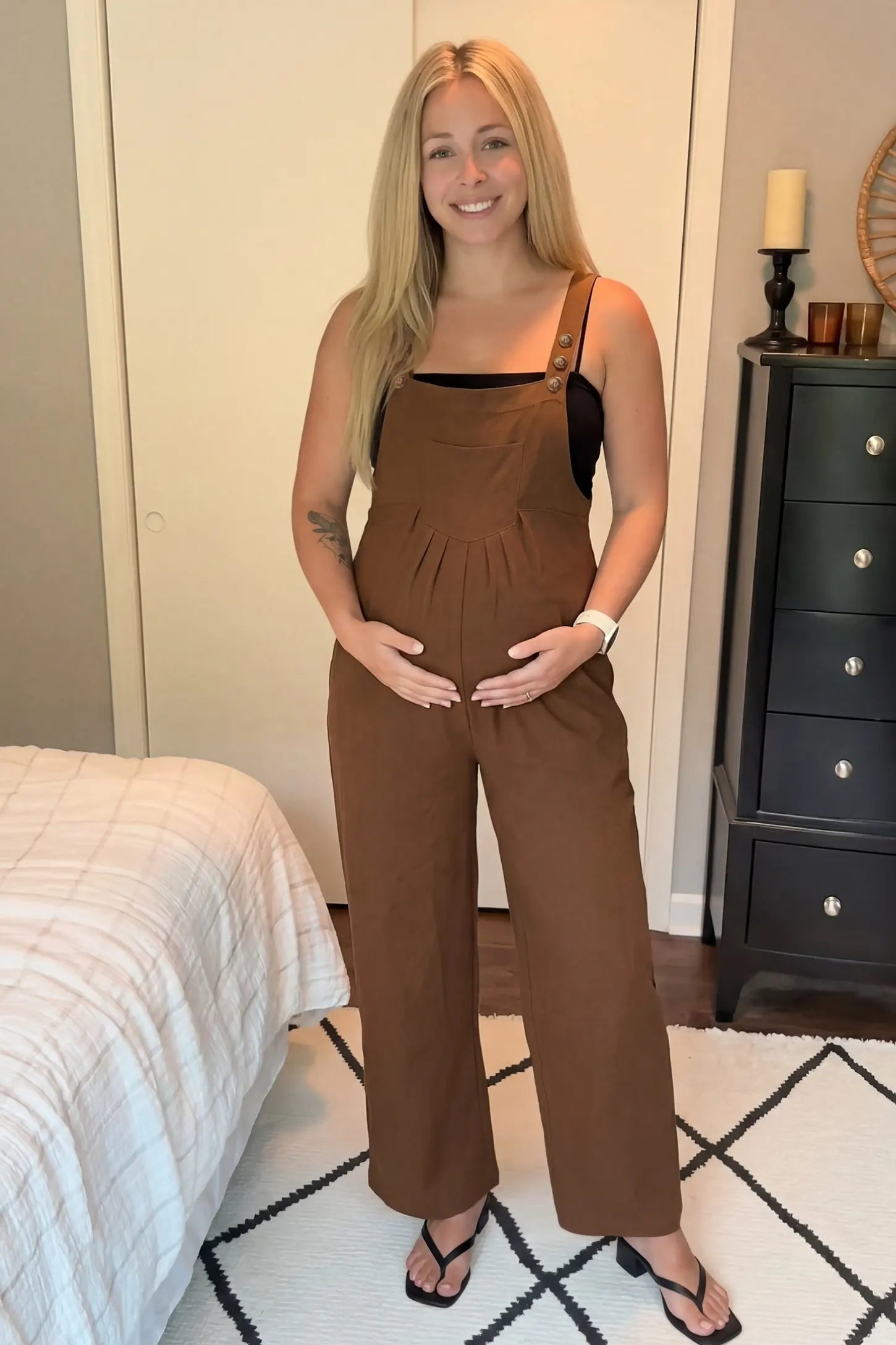 Full-Length Pocketed Maternity Jumpsuit Full-Length Pocketed Maternity Jumpsuit in Camel featuring a relaxed wide-leg cut on a pregnant model, ugc view.