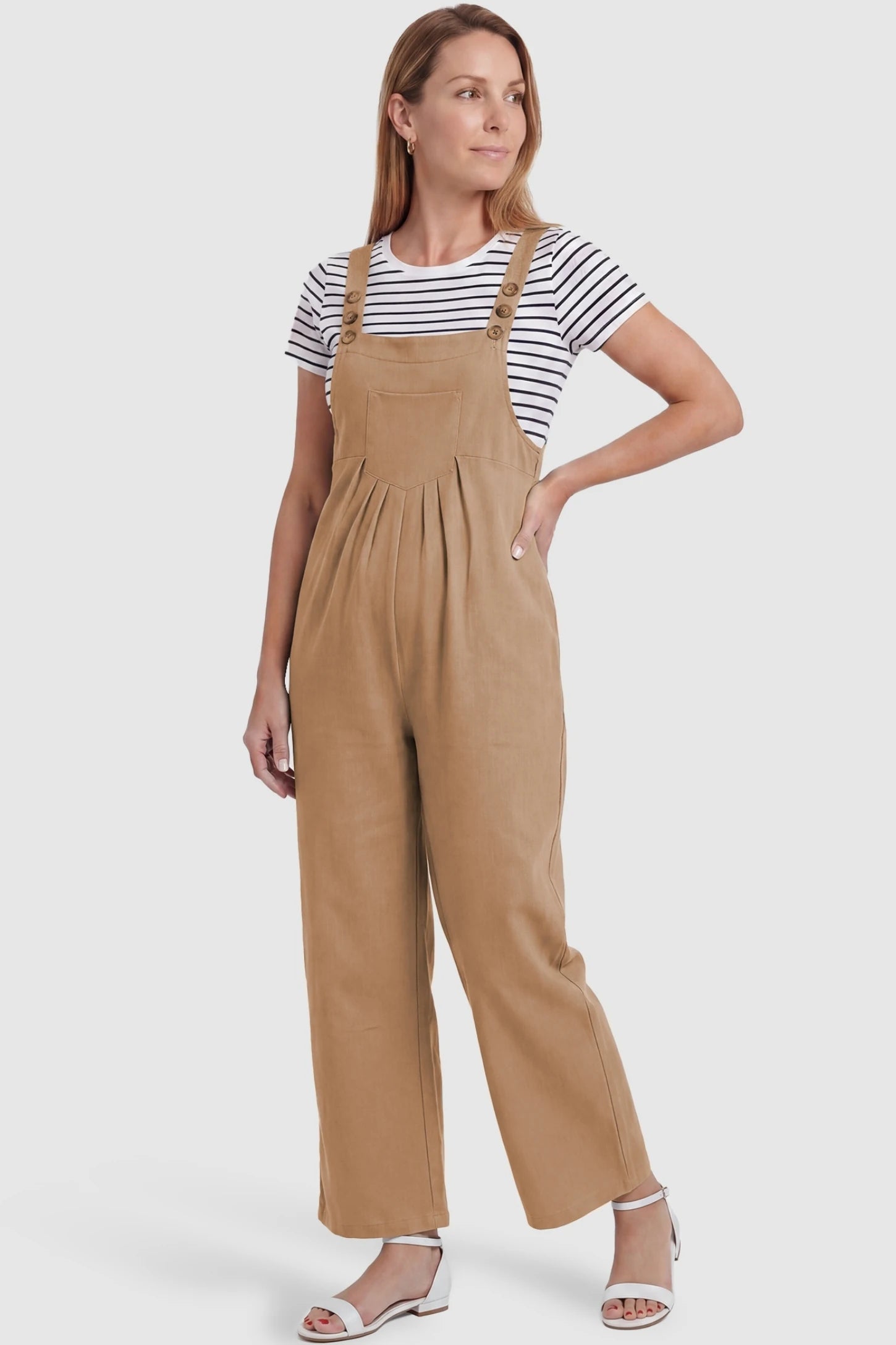 Full-Length Pocketed Maternity Jumpsuit Full-Length Pocketed Maternity Jumpsuit in Khaki featuring a relaxed wide-leg cut on a non-pregnant model, postpartum view.