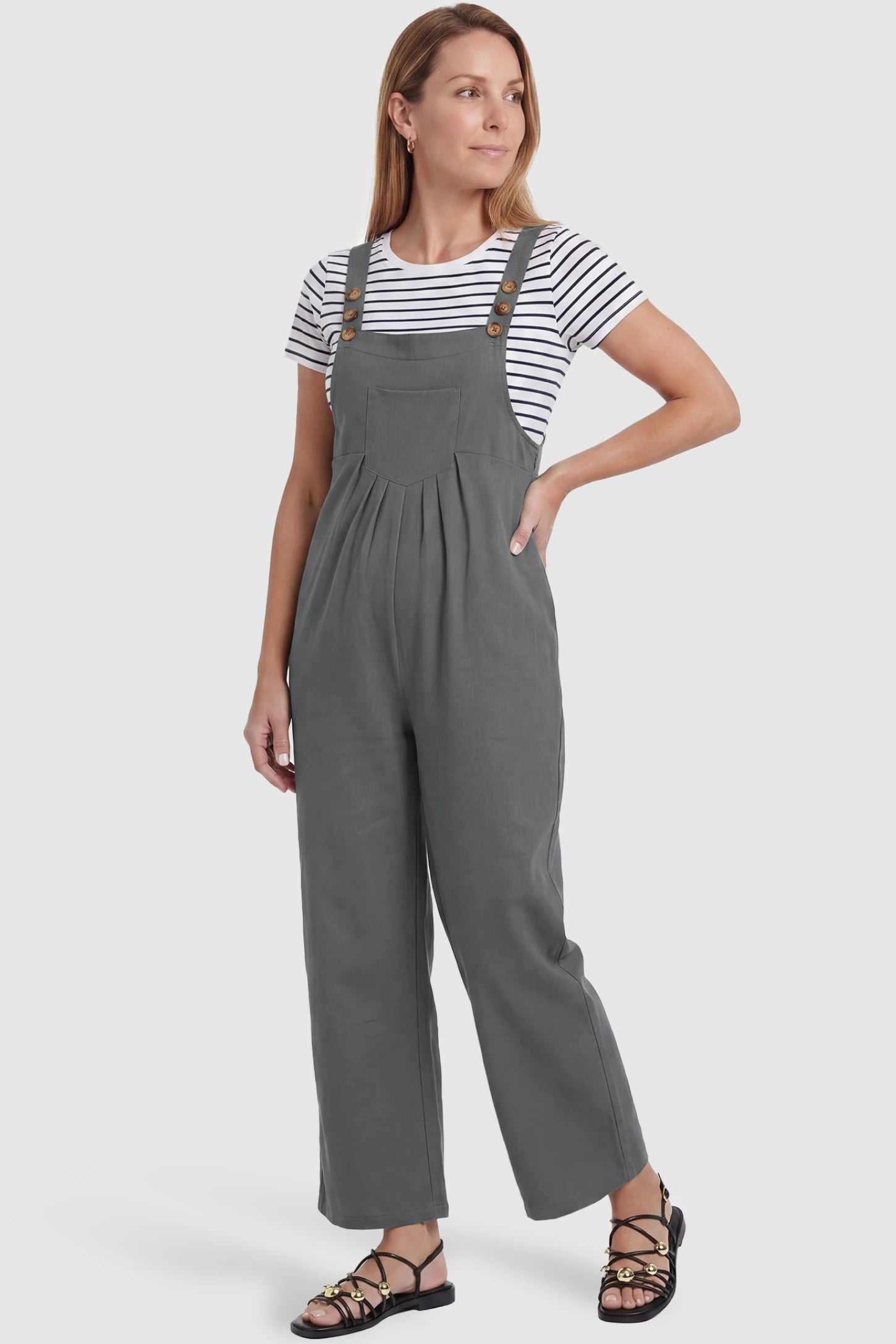 Full-Length Pocketed Maternity Jumpsuit Full-Length Pocketed Maternity Jumpsuit in Light Gray featuring a relaxed wide-leg cut on a non-pregnant model, postpartum view.