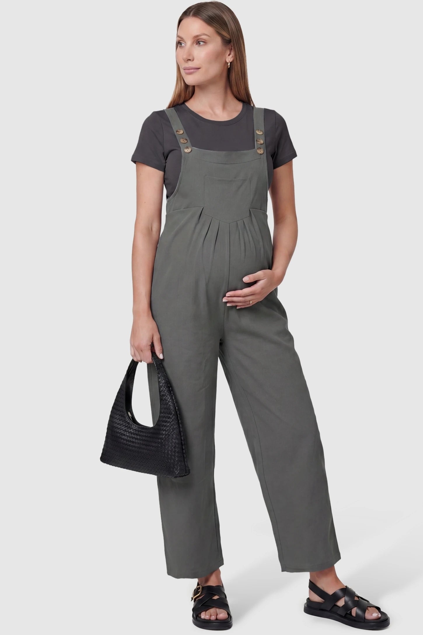 Full-Length Pocketed Maternity Jumpsuit Full-Length Pocketed Maternity Jumpsuit in Light Gray featuring a relaxed wide-leg cut on a pregnant model, styled lifestyle view.