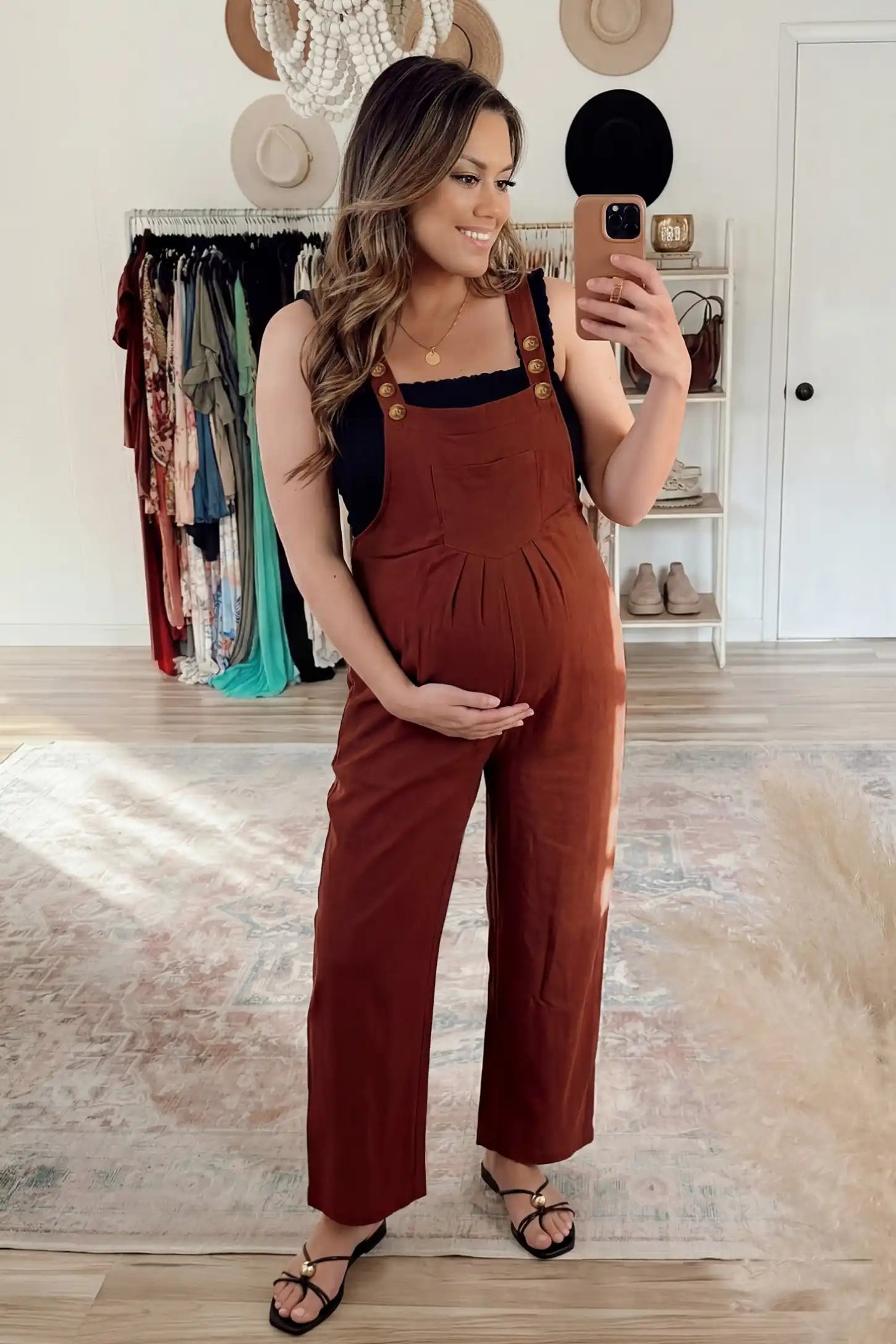 Full-Length Pocketed Maternity Jumpsuit Full-Length Pocketed Maternity Jumpsuit in Orange Red featuring a relaxed wide-leg cut on a pregnant model, ugc view.