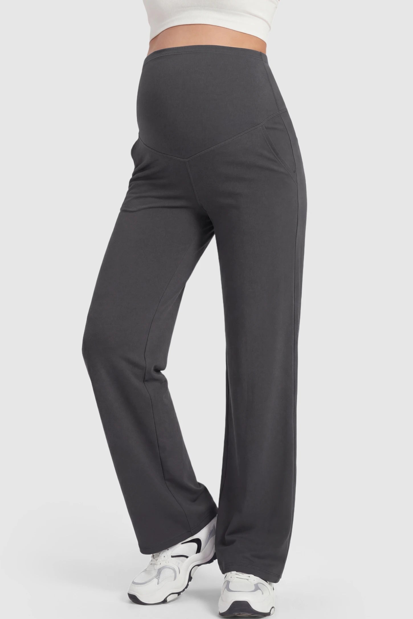 Full Panel High Waist Wide Leg Maternity Pants Full Panel High Waist Wide Leg Maternity Pants in Gray featuring a supportive expansion-waist on a pregnant model showing front.