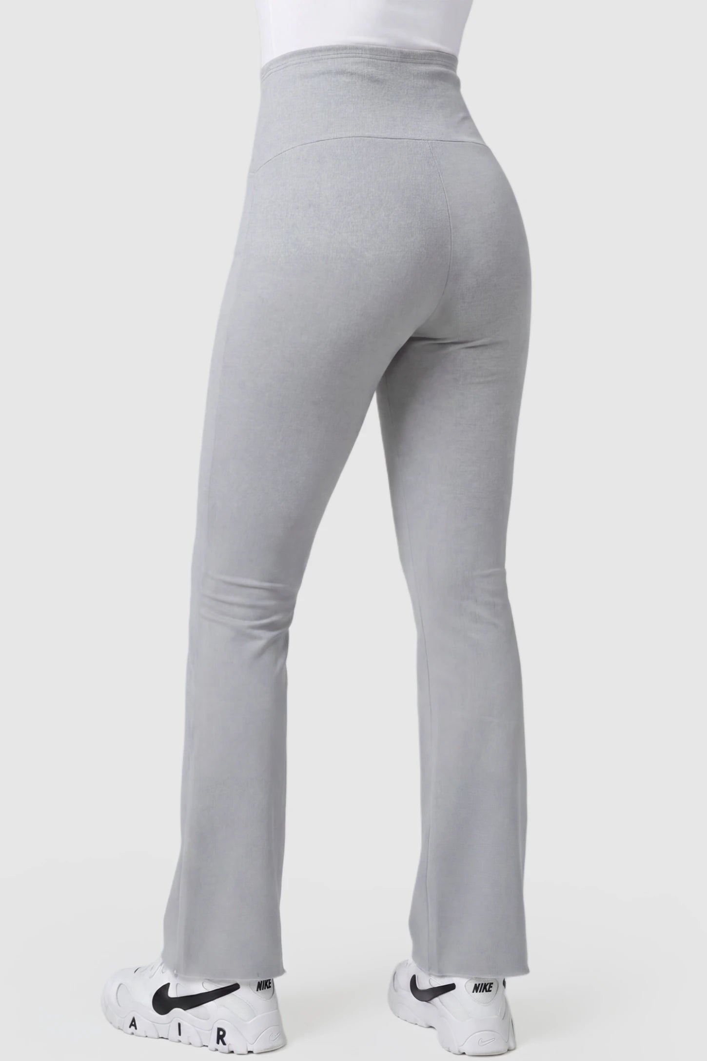 Full Panel Pocketed Flare Leg Maternity Leggings Full Panel Pocketed Flare Leg Maternity Leggings in Gray featuring high stretch on a pregnant model, back view.