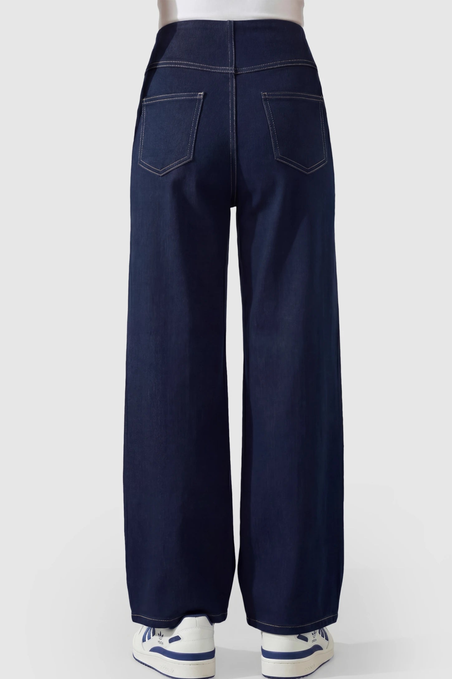 Full Panel Relaxed Wide Leg Maternity Jeans Full Panel Wide-Leg Maternity Jeans in Blue featuring a belly panel on a pregnant model showing back.