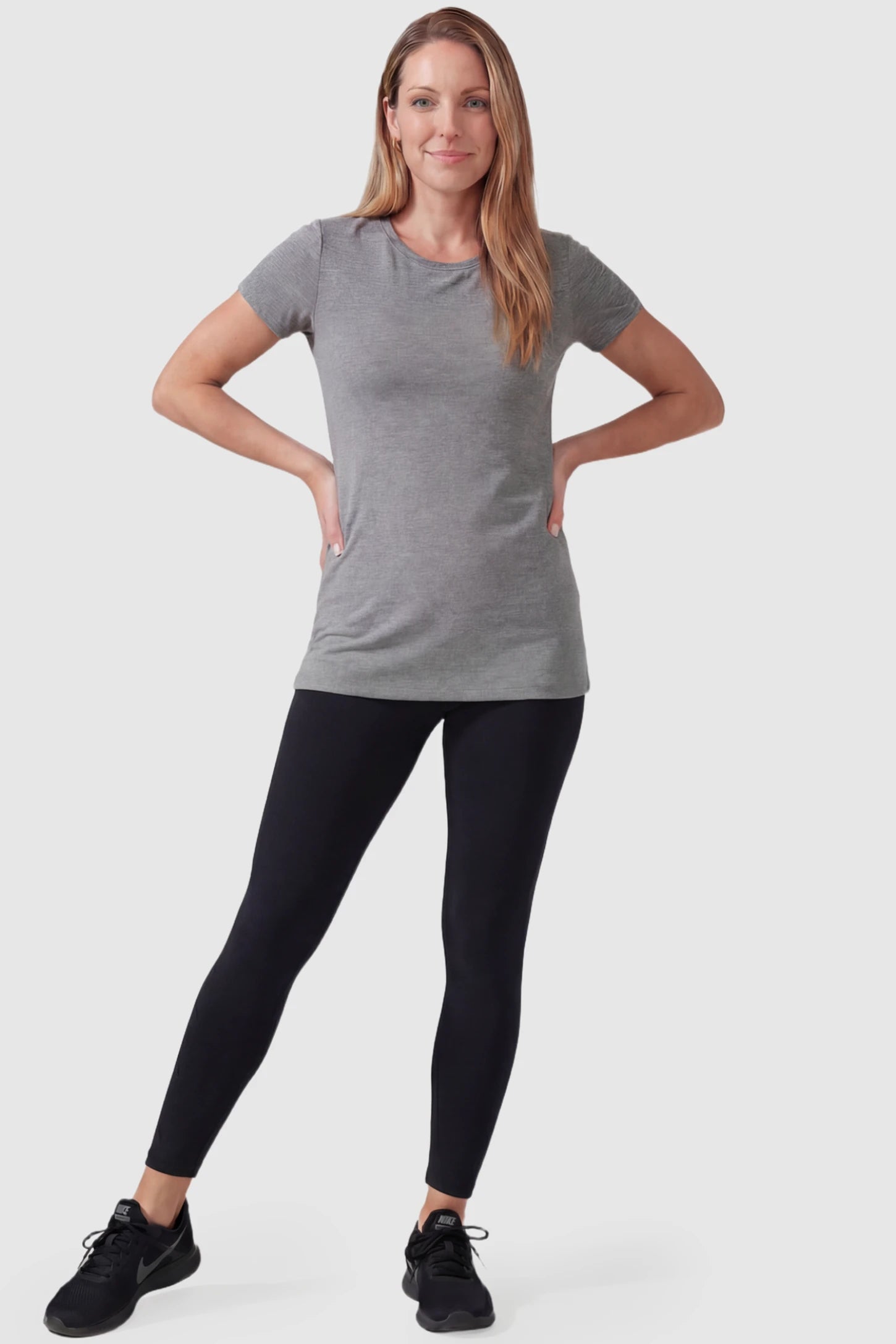 Full Panel Slim Fit Maternity Leggings Full Panel Slim Fit Maternity Leggings in Black featuring a seamless over-the-belly waistband on a postpartum model, front view.