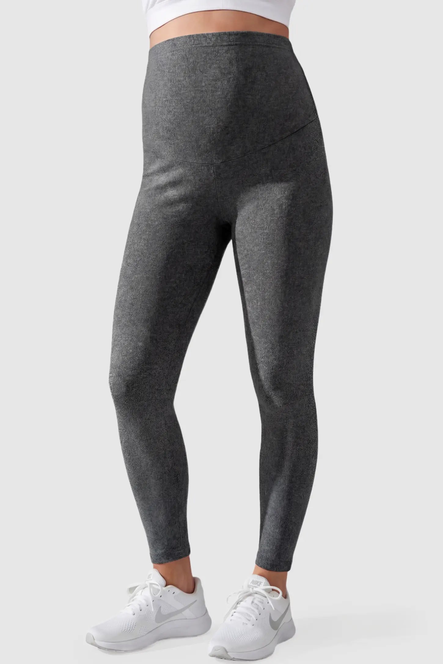 Full Panel Slim Fit Maternity Leggings in Dark Gray featuring a seamless over-the-belly waistband on a pregnant model, front view.