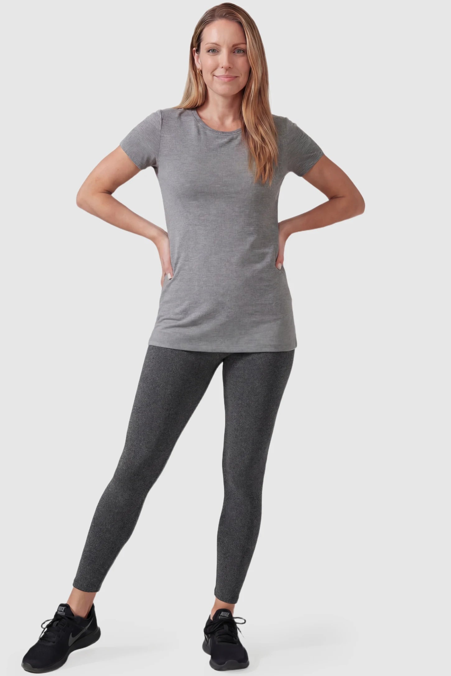 Full Panel Slim Fit Maternity Leggings Full Panel Slim Fit Maternity Leggings in Dark Gray featuring a seamless over-the-belly waistband on a postpartum model, front view.