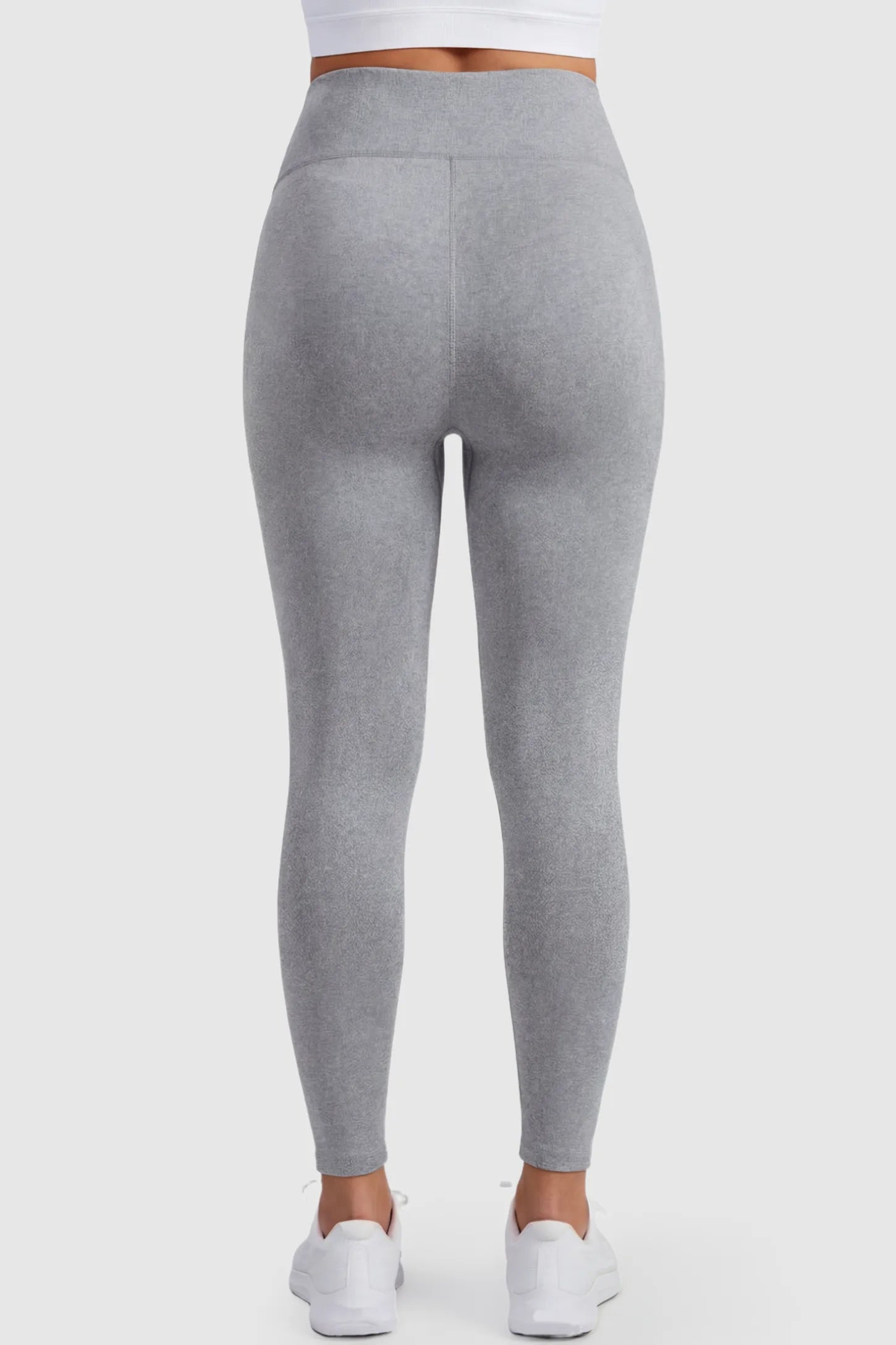 Full Panel Slim Fit Maternity Leggings Full Panel Slim Fit Maternity Leggings in Light Gray featuring elastic and breathable fabric on a pregnant model, back view.
