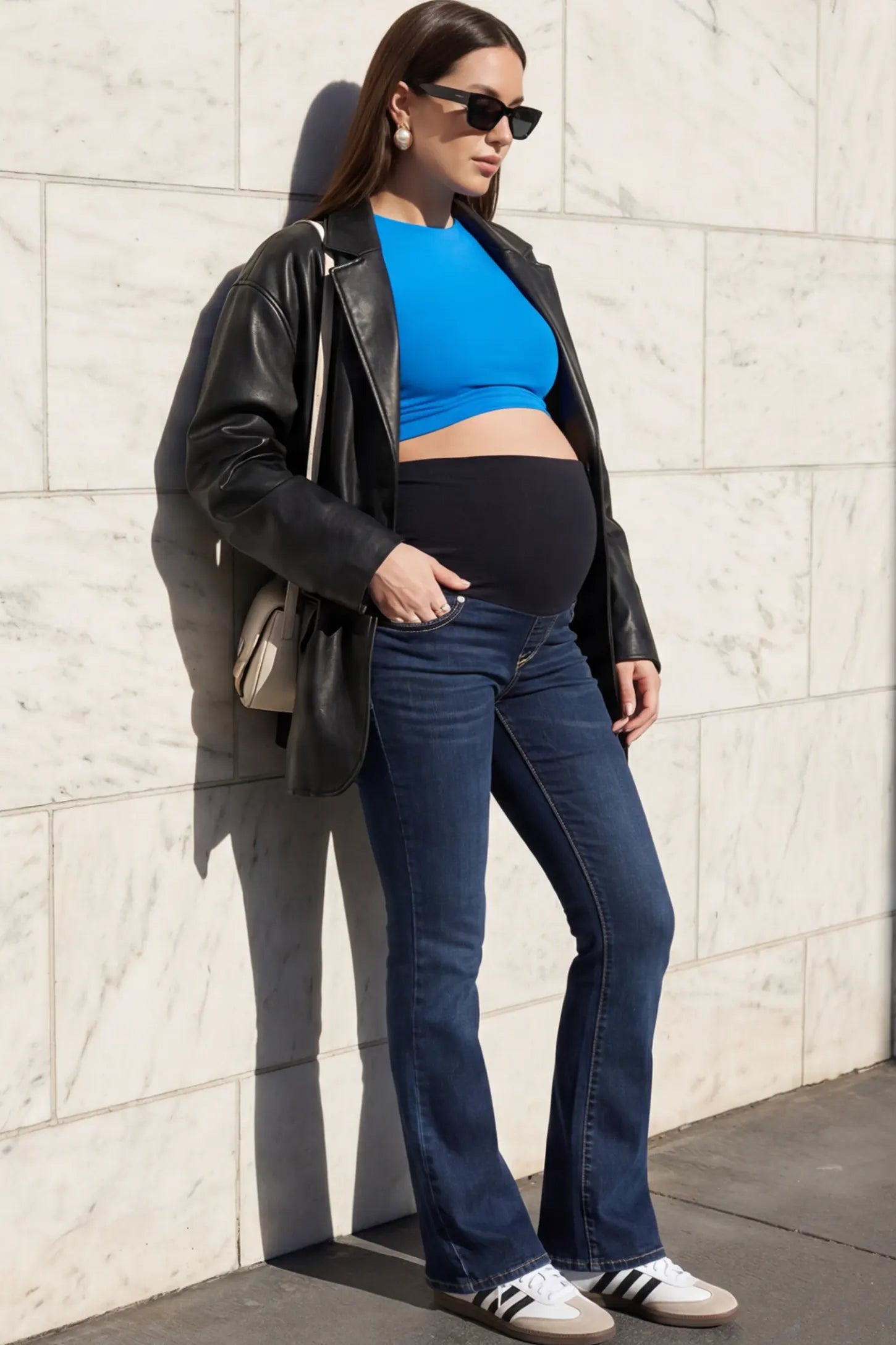 Full Panel Classic Straight Leg Maternity Jeans Full Panel Straight Leg Maternity Jeans in dark blue featuring a stretch support panel on a pregnant model.