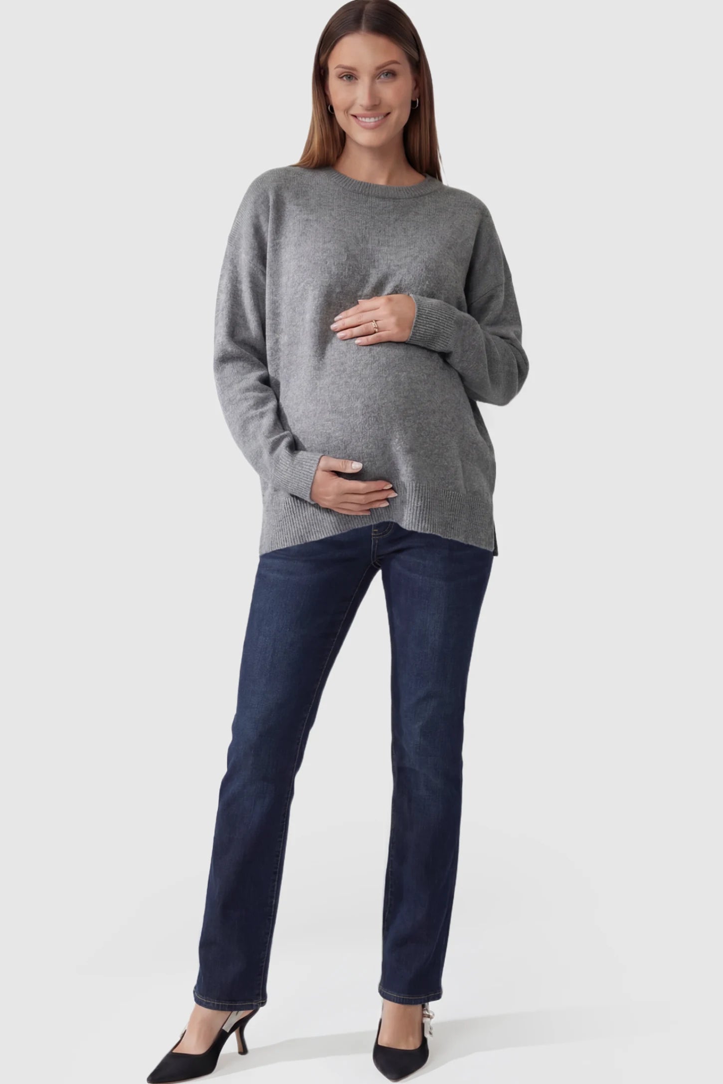 Full Panel Classic Straight Leg Maternity Jeans Full Panel Straight Leg Maternity Jeans in dark blue featuring a stretch support panel on a pregnant model facing front.