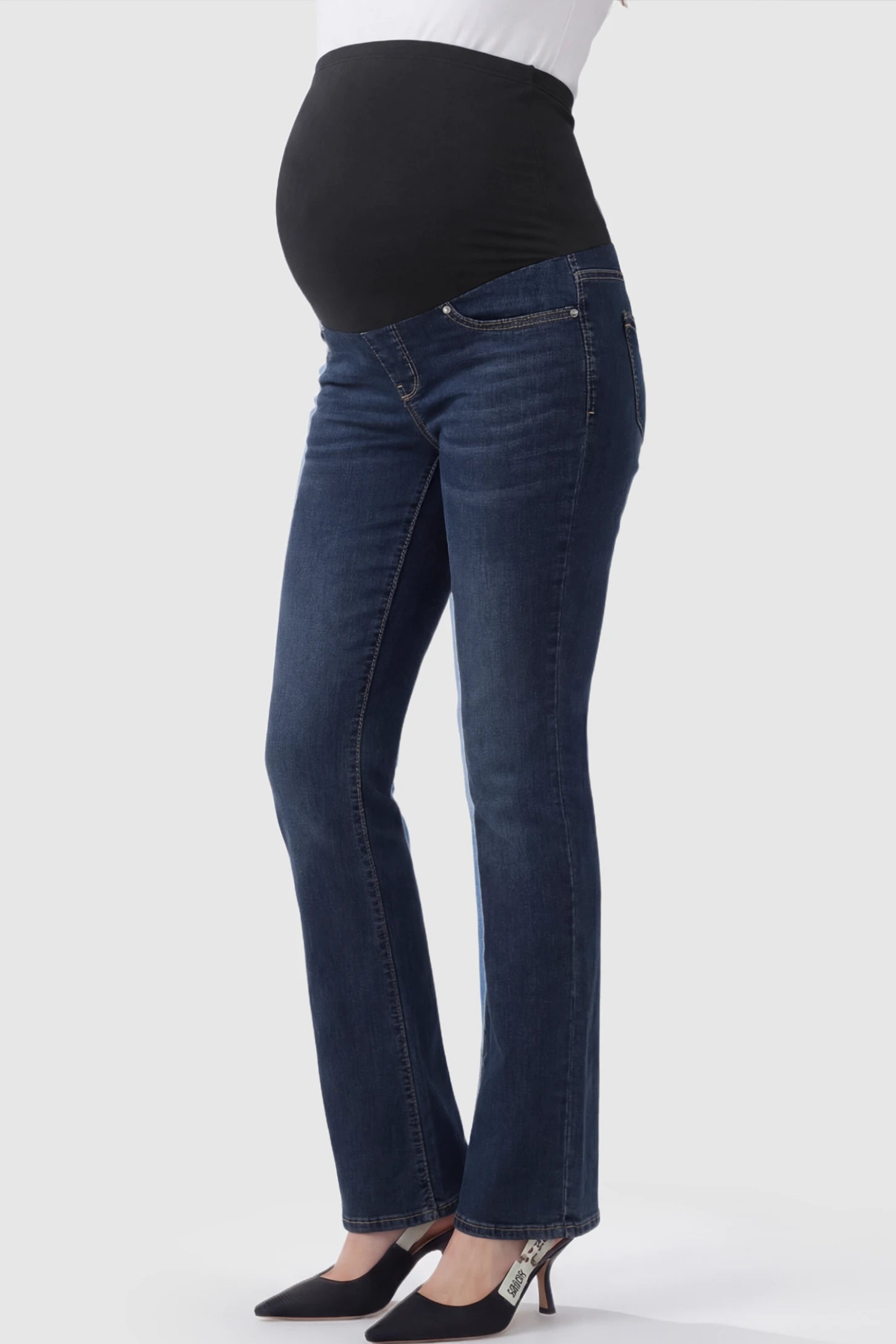 Full Panel Classic Straight Leg Maternity Jeans Full Panel Straight Leg Maternity Jeans in dark blue featuring a stretch support panel on a pregnant model showing side.