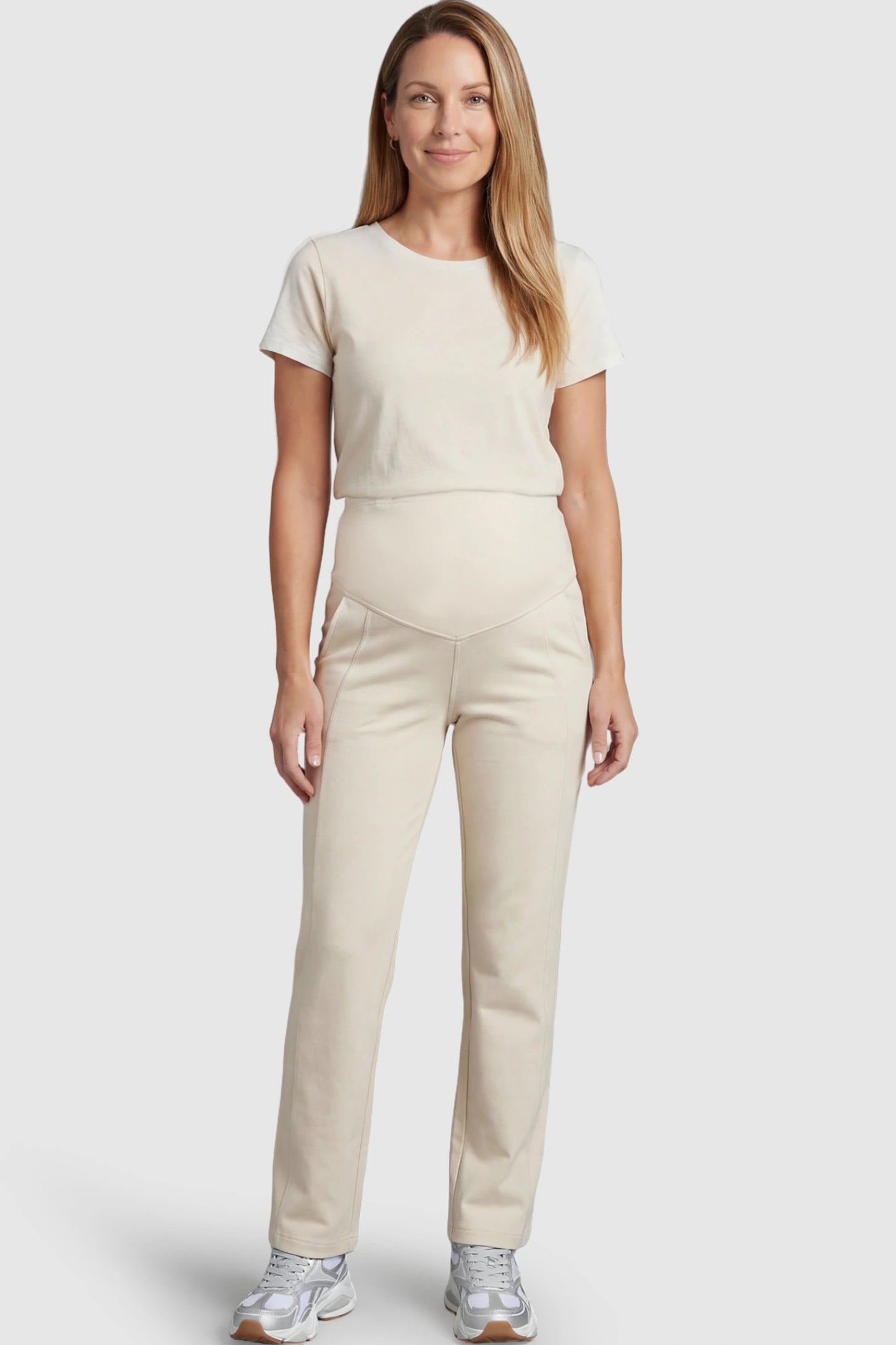 Full Panel Wide Leg Maternity Lounge Pants Full Panel Wide Leg Maternity Lounge Pants in beige featuring a high-stretch full belly panel and pockets on a postpartum model showing front.