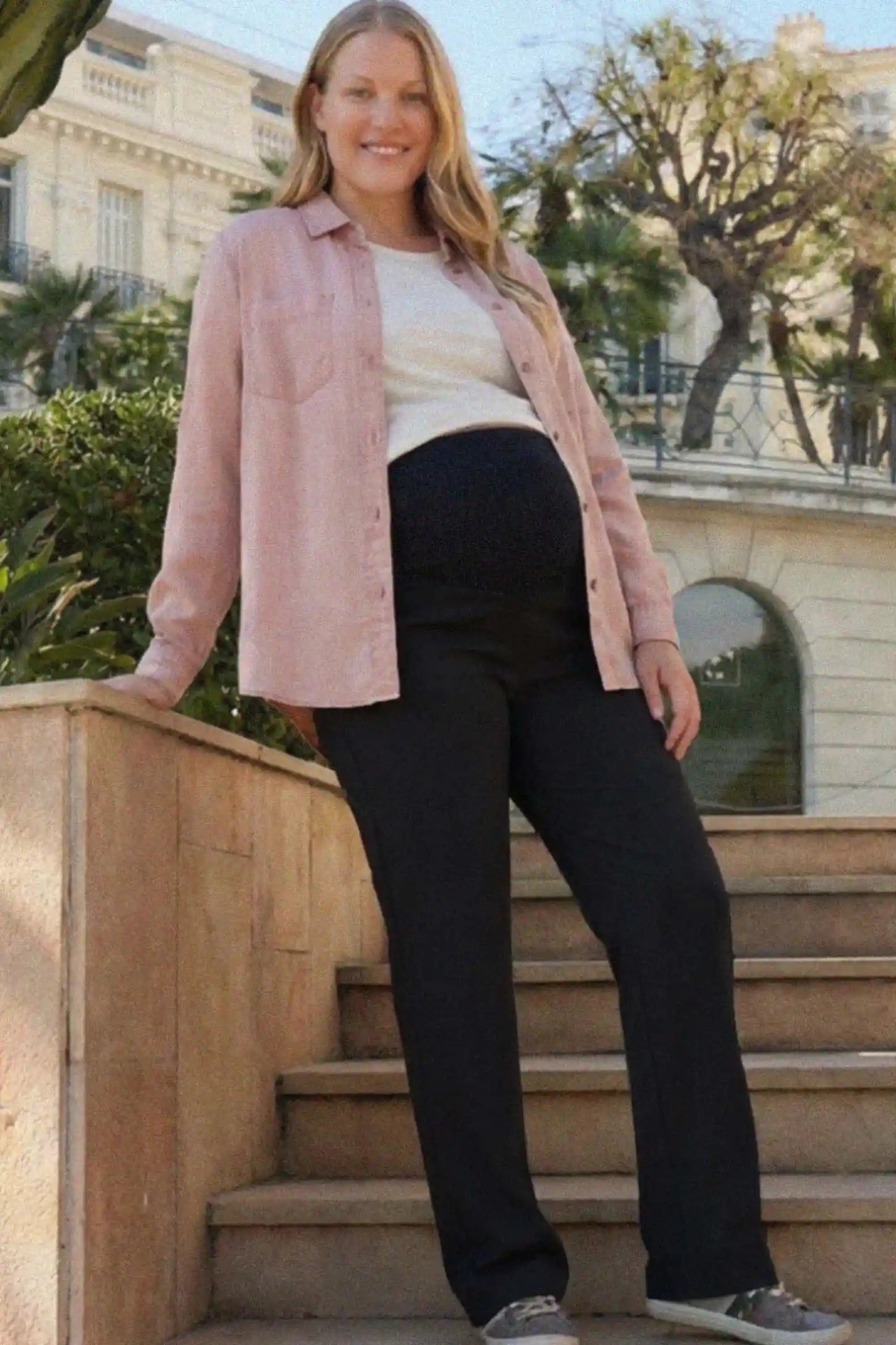Full Panel Wide Leg Maternity Lounge Pants Full Panel Wide Leg Maternity Lounge Pants in black featuring a high-stretch full belly panel and pockets on a pregnant woman.