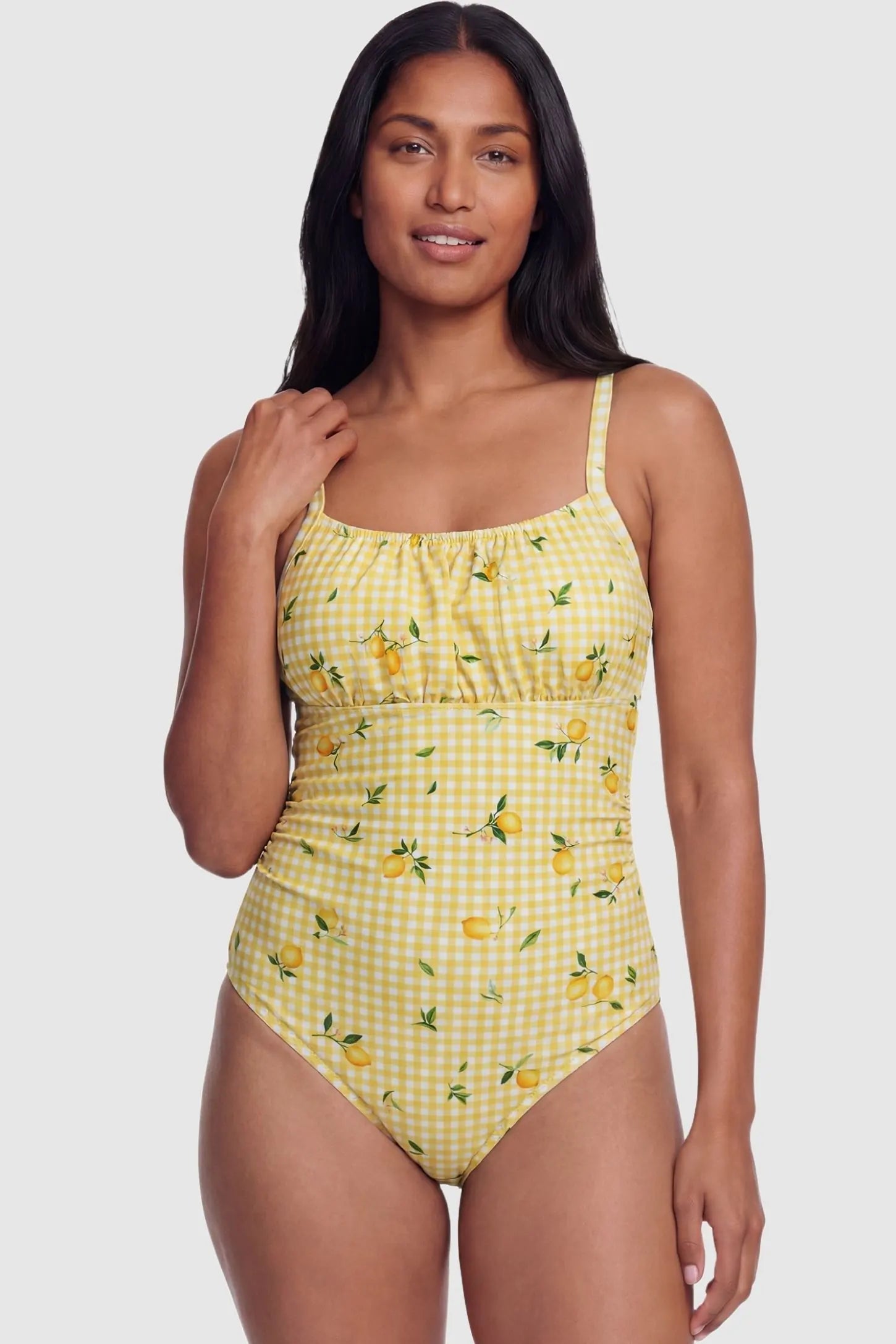Gingham Matte Ruched Fit Maternity Swimsuit Gingham Matte Ruched Fit Maternity Swimsuit in light yellow with gentle tummy control and flexible fit, postpartum front view on non pregnant model.