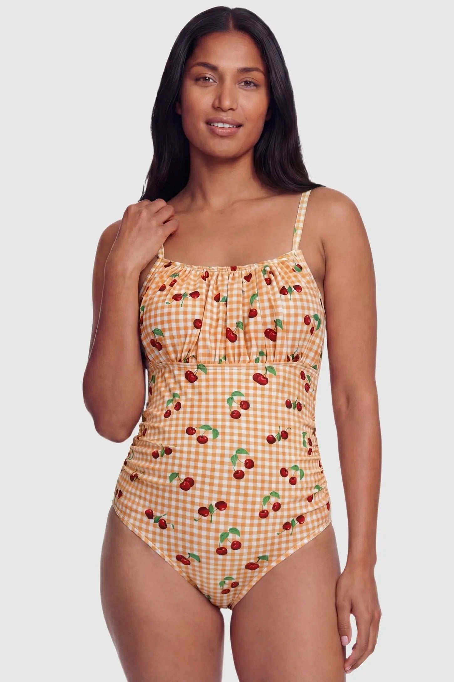 Gingham Matte Ruched Fit Maternity Swimsuit Gingham Matte Ruched Fit Maternity Swimsuit in yellow with flexible fit and gentle tummy control, postpartum front view on non pregnant model.