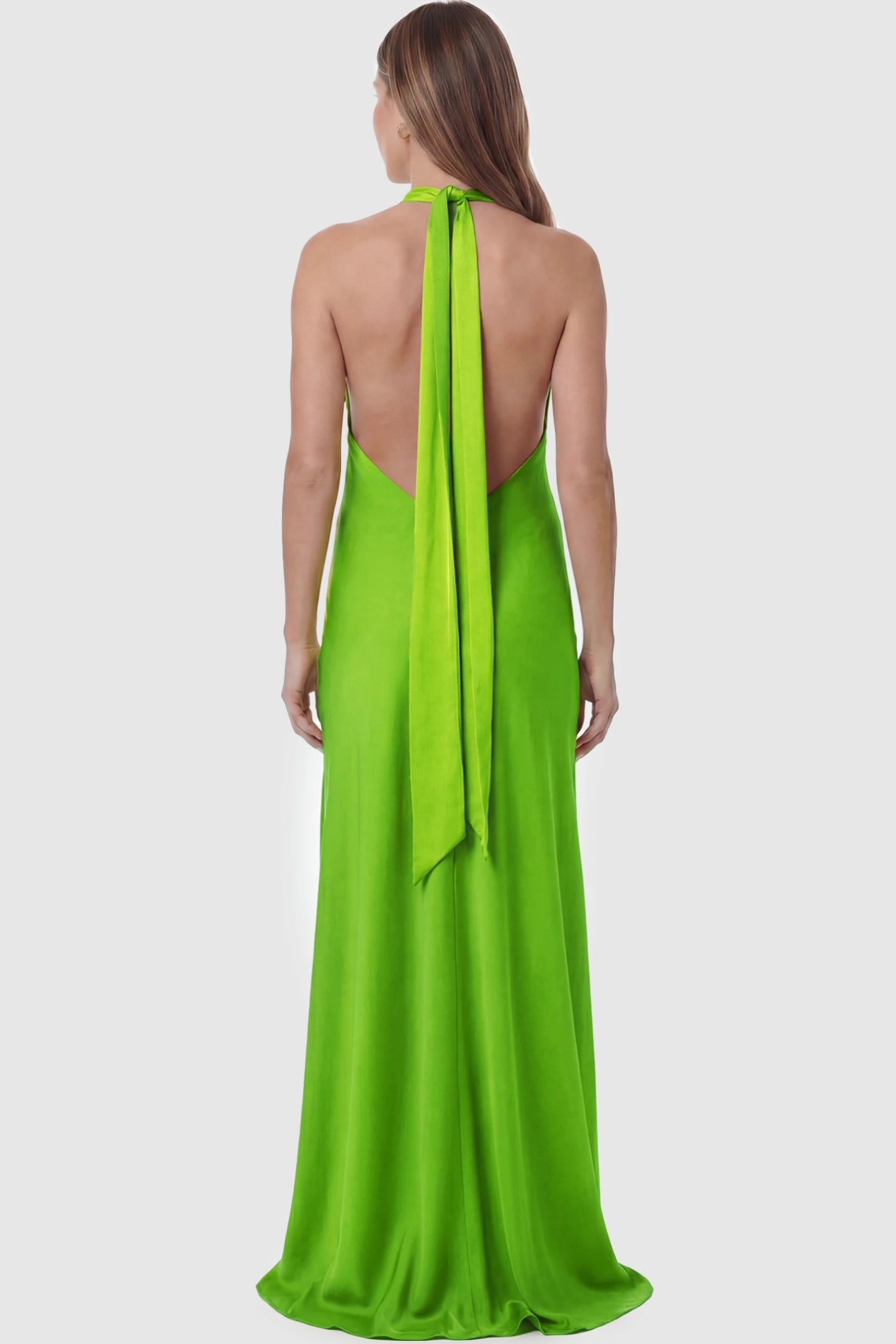 Solid Halter Neck Maternity Maxi Dress Solid Halter Neck Maternity Maxi Dress in Green featuring a flowing skirt and backless design on a pregnant model showing back.