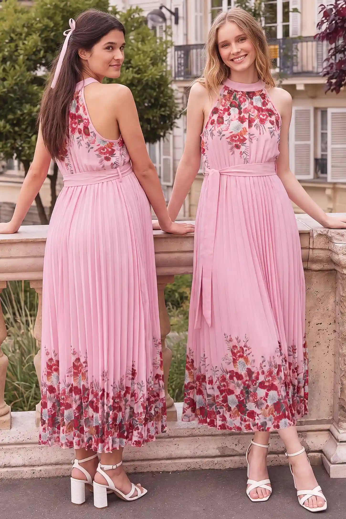 Halter Neck Pleated Maternity Midi Dress Halter Neck Pleated Maternity Midi Dress in Rose Pink Floral featuring a chic halter neckline on a pregnant model, lifestyle front view.