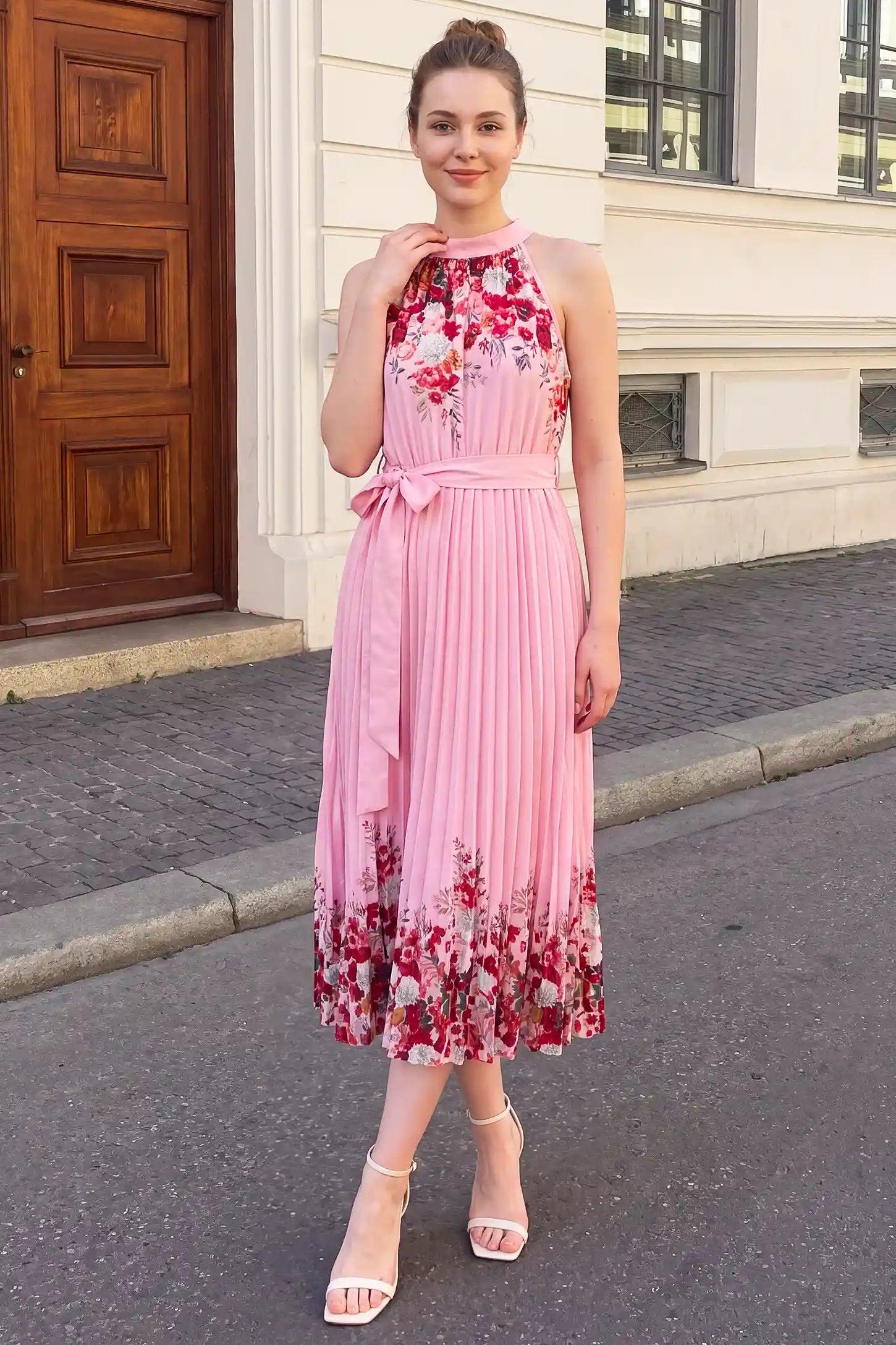 Halter Neck Pleated Maternity Midi Dress Halter Neck Pleated Maternity Midi Dress in Rose Pink Floral showcasing versatile postpartum style, lifestyle view on a non pregnant model.