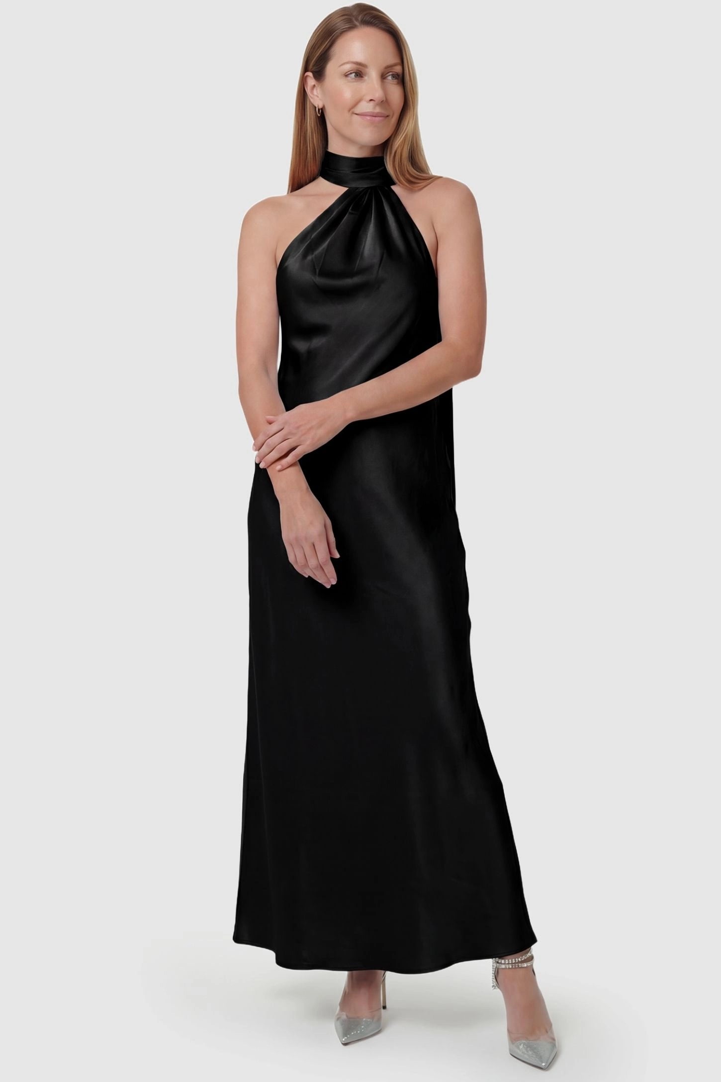 High-Shine Halter Sleeveless Maternity Maxi Dress High-Shine Halter Sleeveless Maternity Maxi Dress in Black featuring a flexible fit on a non-pregnant model, front view.