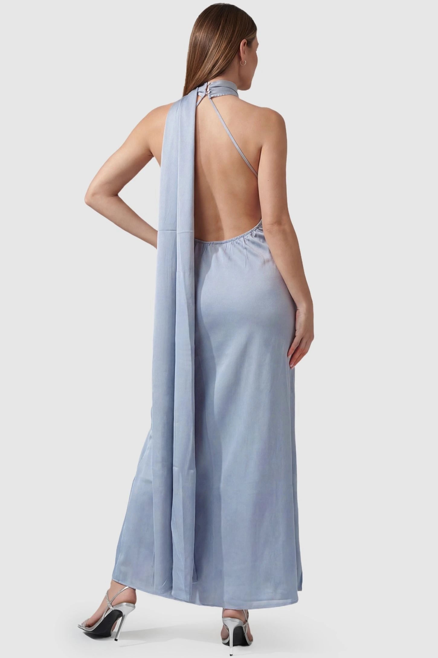 High-Shine Halter Sleeveless Maternity Maxi Dress High-Shine Halter Sleeveless Maternity Maxi Dress in Blue featuring minimalist halter straps on a pregnant model, back view.