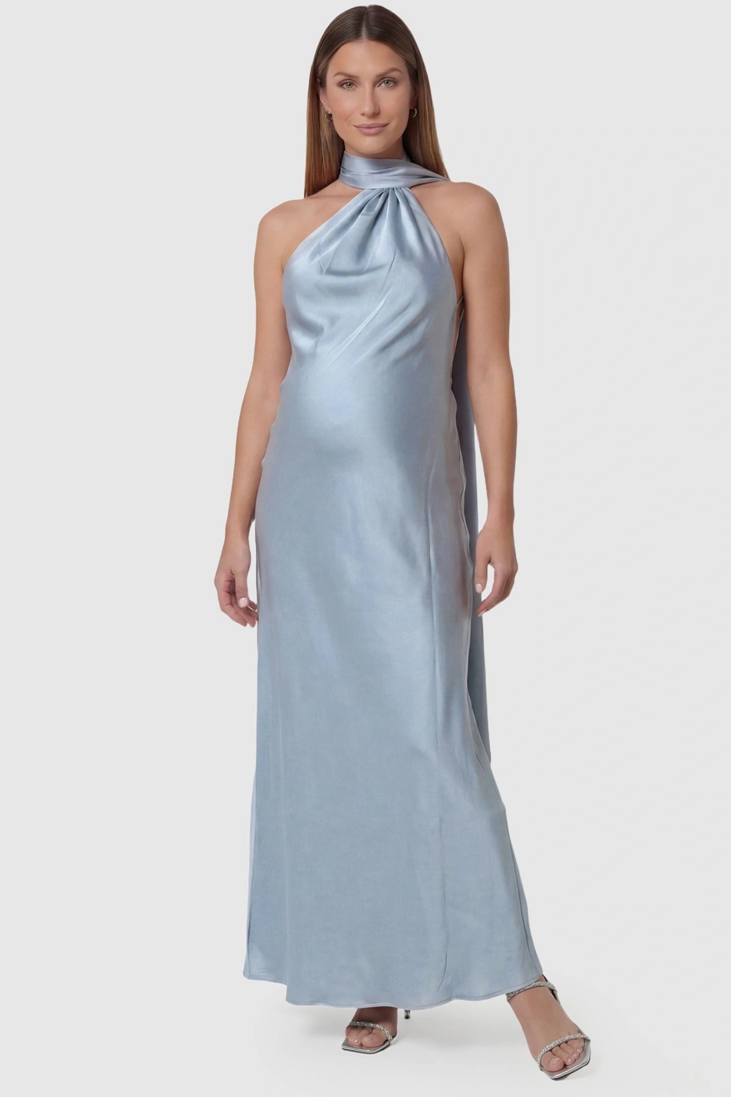 High-Shine Halter Sleeveless Maternity Maxi Dress High-Shine Halter Sleeveless Maternity Maxi Dress in Blue featuring a gathered high-neck on a pregnant model, front view.