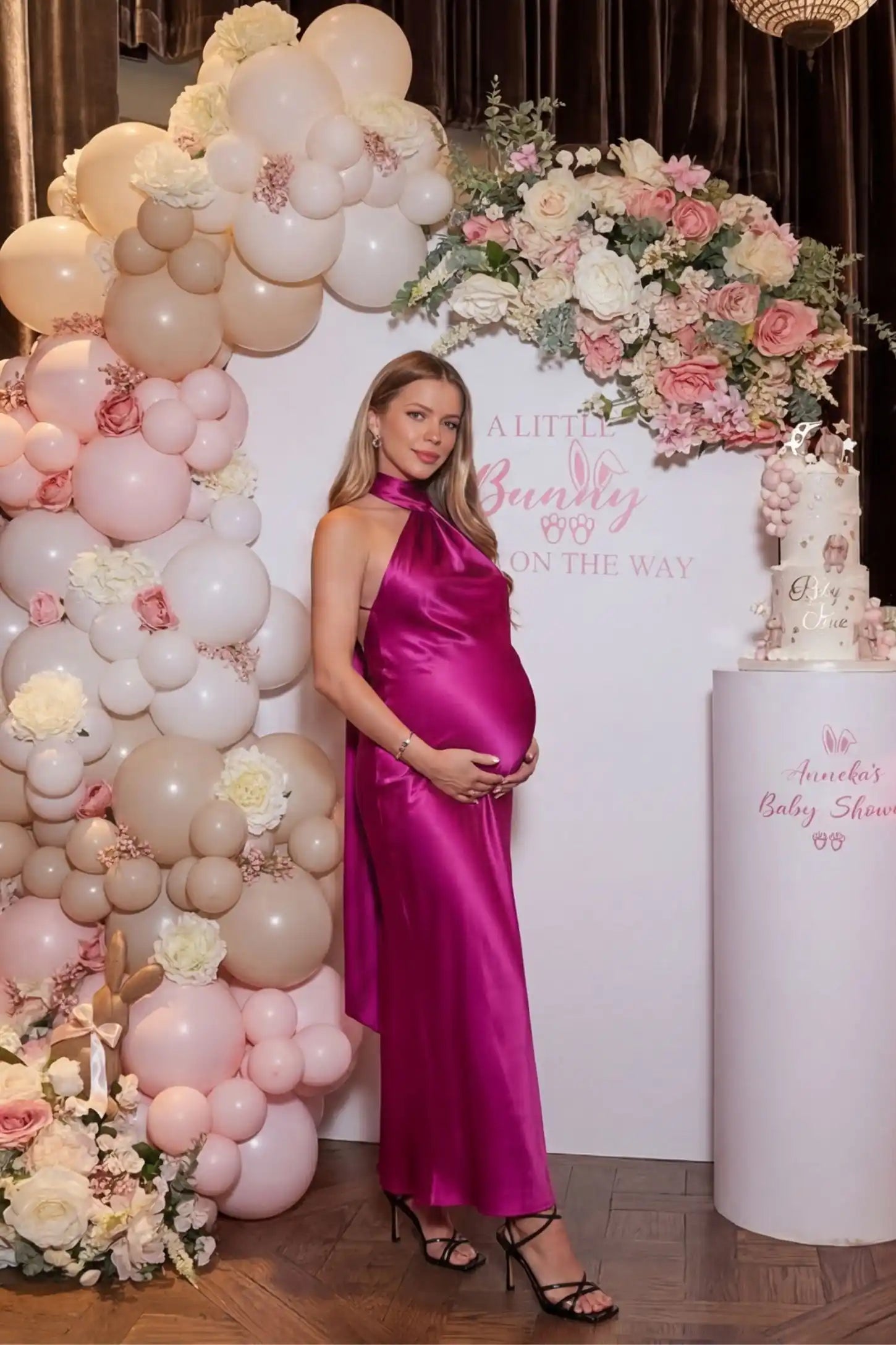 High-Shine Halter Sleeveless Maternity Maxi Dress High-Shine Halter Sleeveless Maternity Maxi Dress in Pink featuring a luxe texture on a pregnant model,
