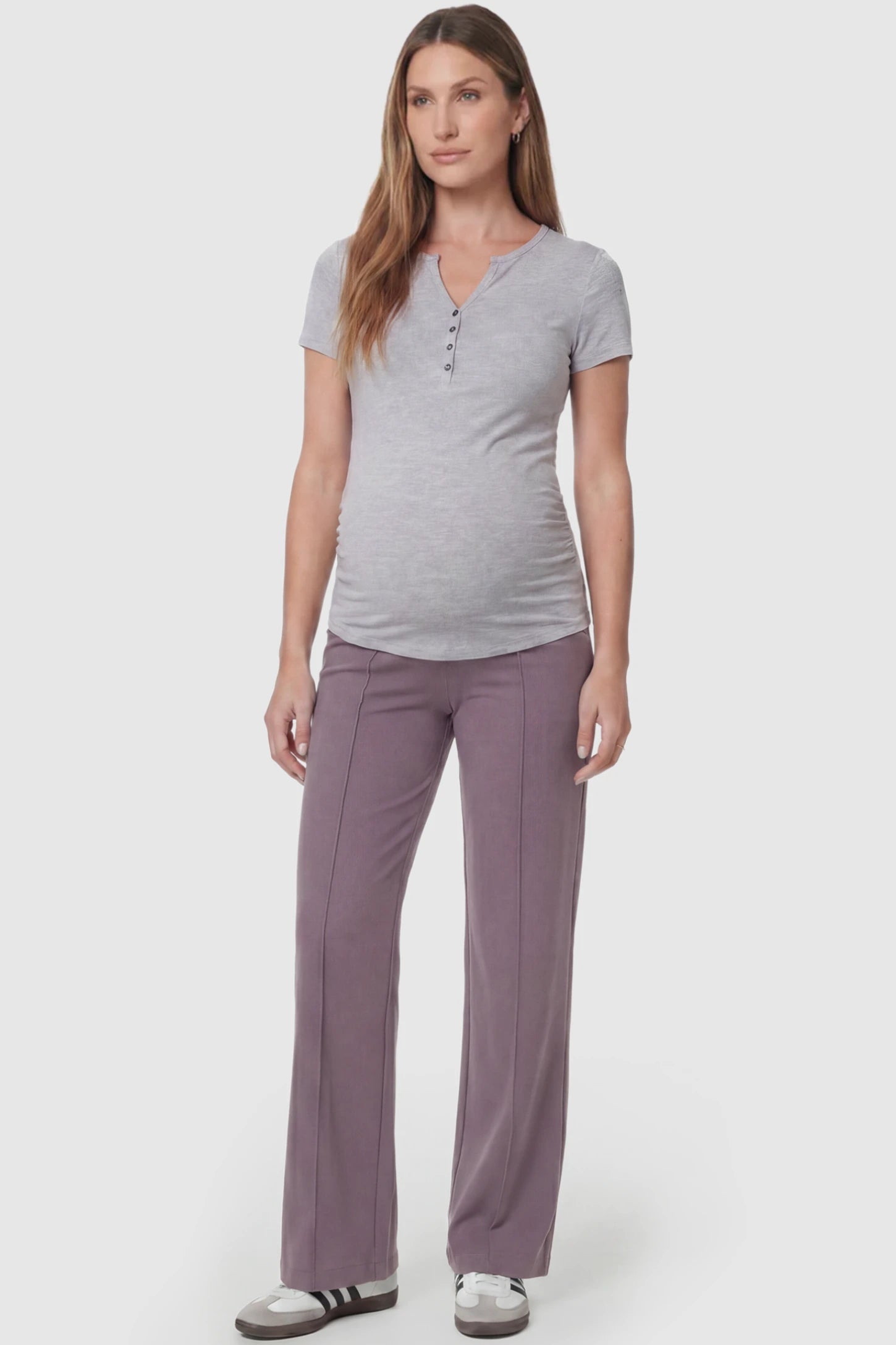 High Stretch Wide Leg Pocketed Maternity Pants High-Stretch Wide Leg Pocketed Maternity Pants in Brown featuring a seamless over-the-bump panel and side pocket on a pregnant model, full body view.