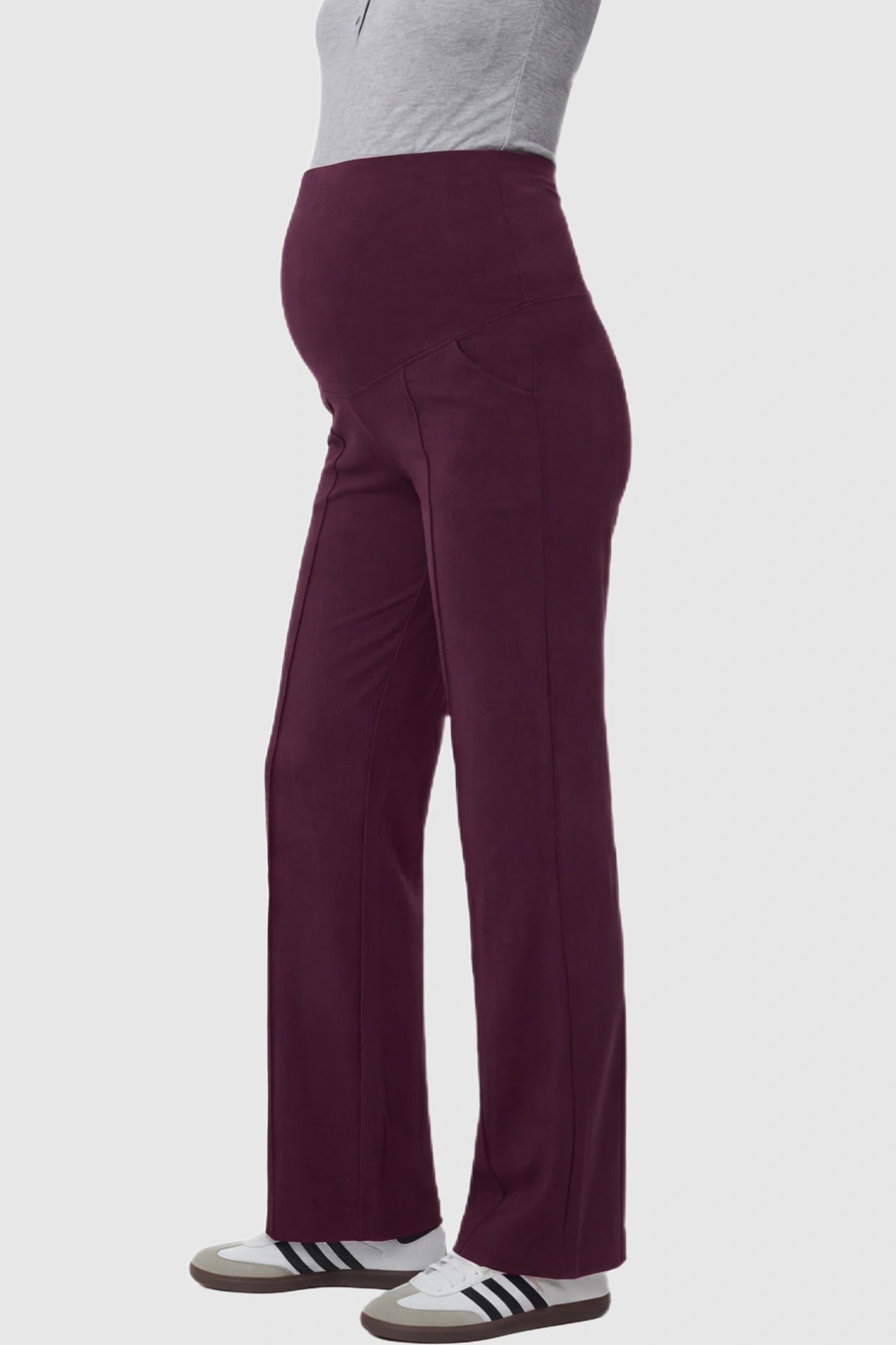 High Stretch Wide Leg Pocketed Maternity Pants High-Stretch Wide Leg Pocketed Maternity Pants in Burgundy featuring a seamless over-the-bump panel and side pocket on a pregnant model side view.