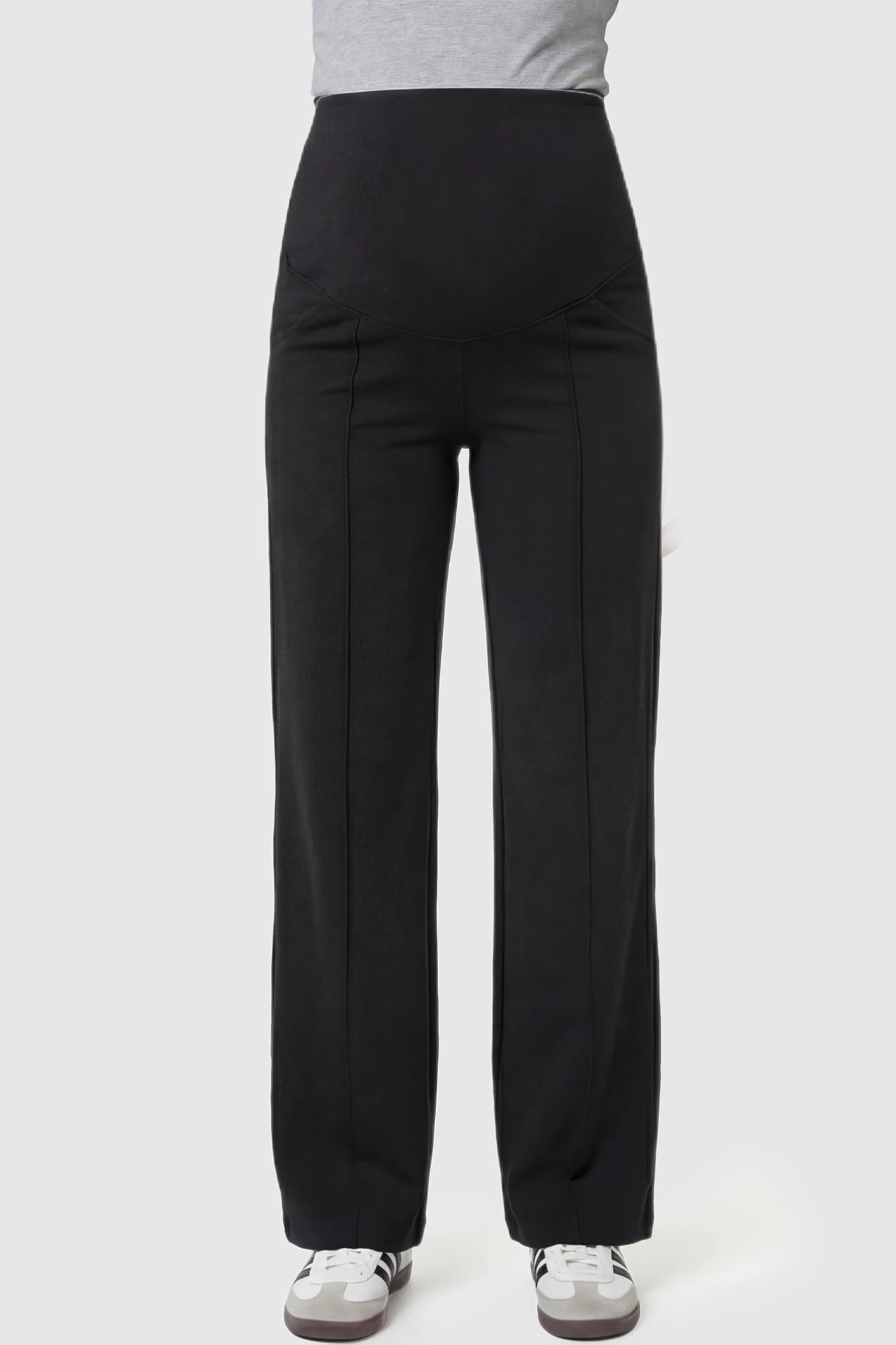 High Stretch Wide Leg Pocketed Maternity Pants High-Stretch Wide Leg Pocketed Maternity Pants in Black featuring a seamless over-the-bump panel and side pocket on a pregnant model showing front.