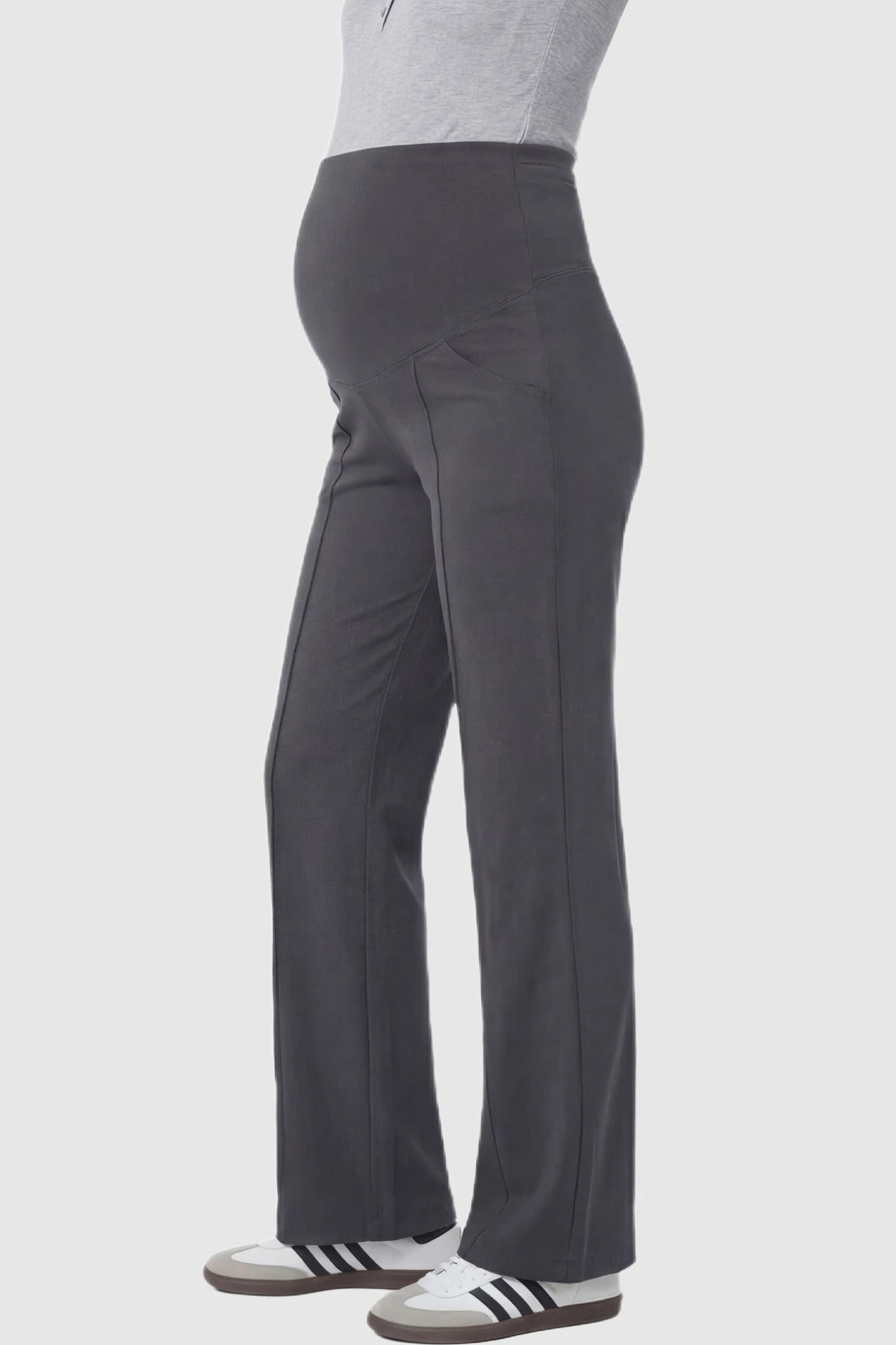 High Stretch Wide Leg Pocketed Maternity Pants High-Stretch Wide Leg Pocketed Maternity Pants in Dark Gray featuring a seamless over-the-bump panel and side pocket on a pregnant model showing side.