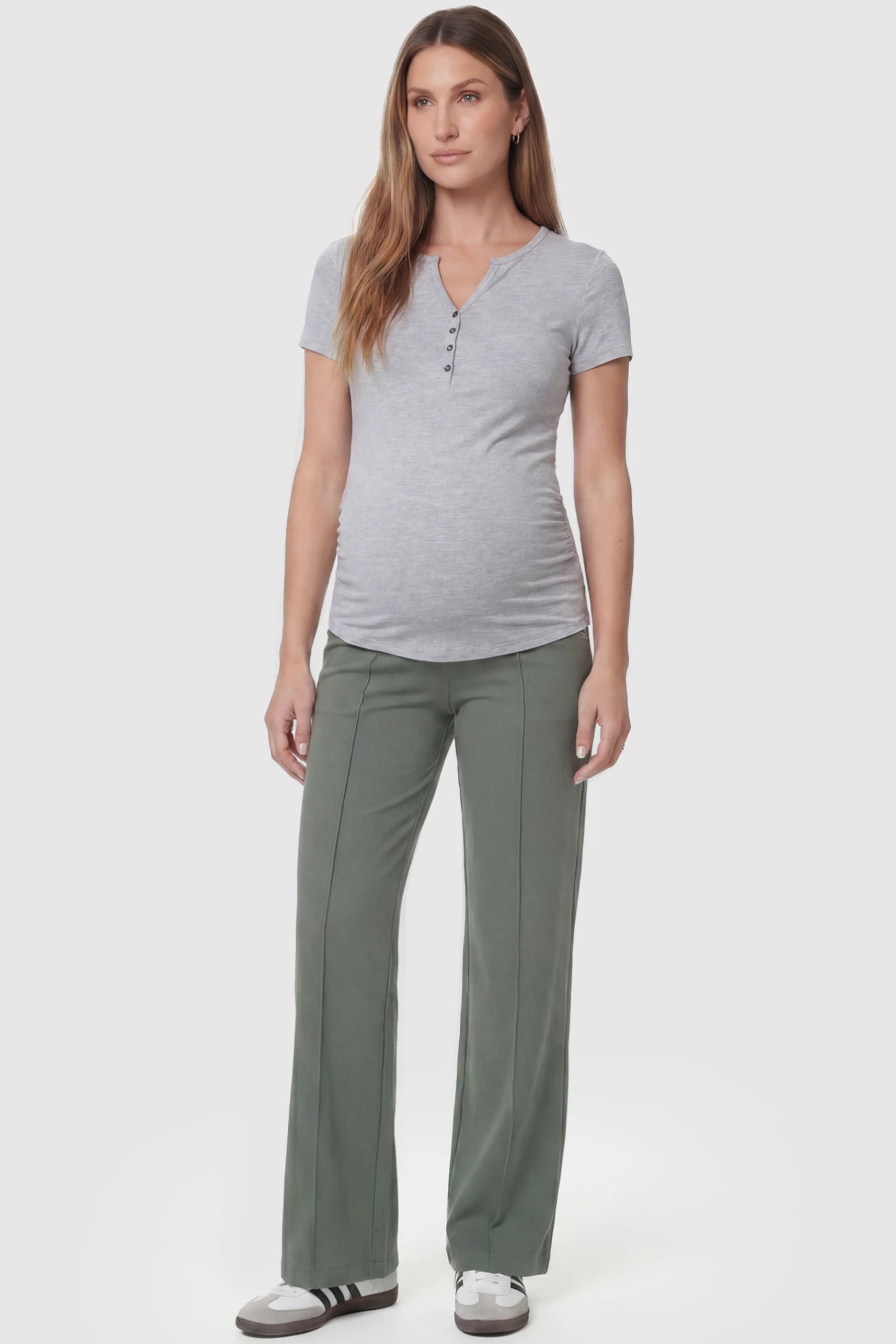 High Stretch Wide Leg Pocketed Maternity Pants High-Stretch Wide Leg Pocketed Maternity Pants in Green featuring a seamless over-the-bump panel and side pocket on a pregnant model, full body view.
