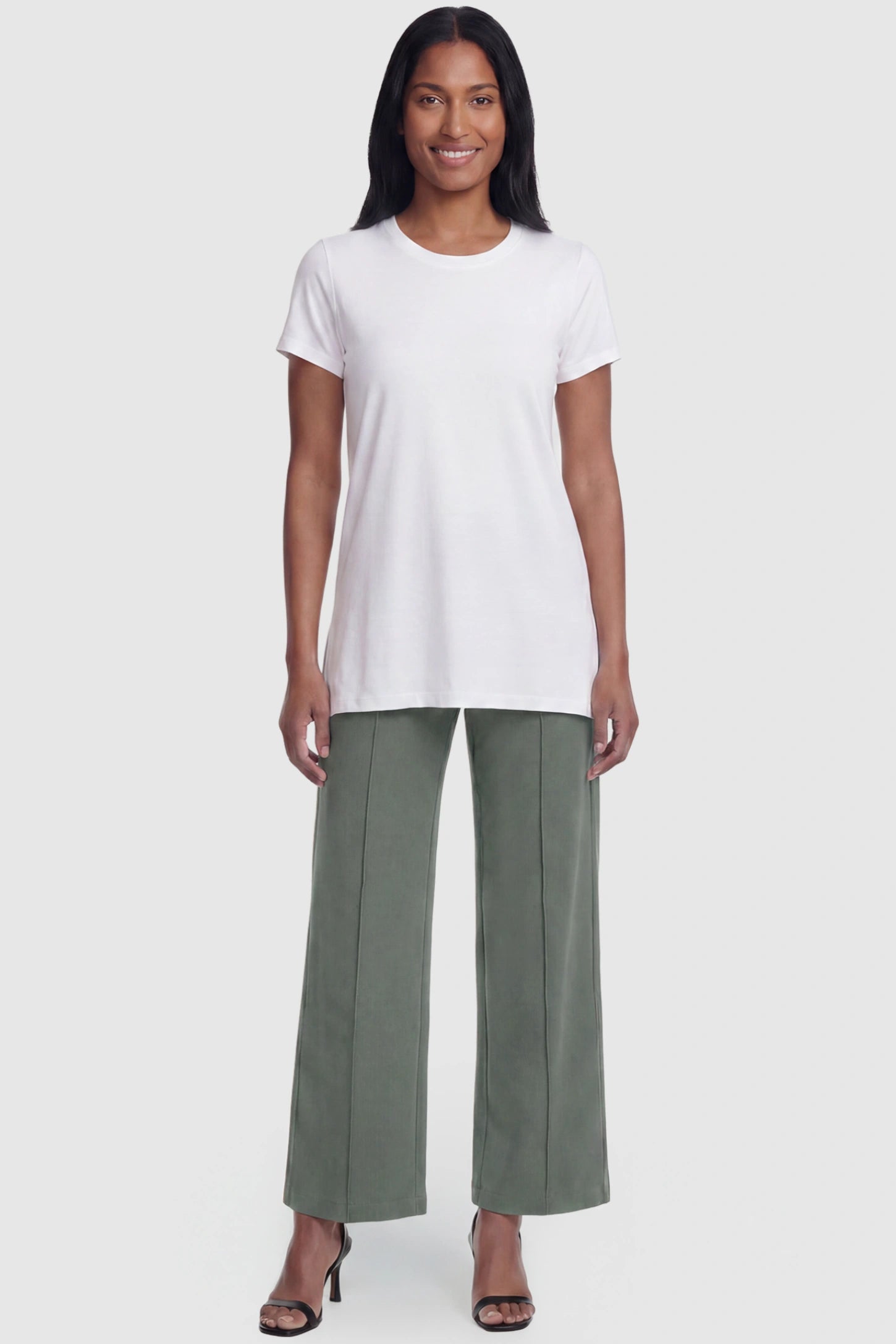 High Stretch Wide Leg Pocketed Maternity Pants High-Stretch Wide Leg Pocketed Maternity Pants in Green featuring a seamless over-the-bump panel and side pocket on a postpartum model, full body view.