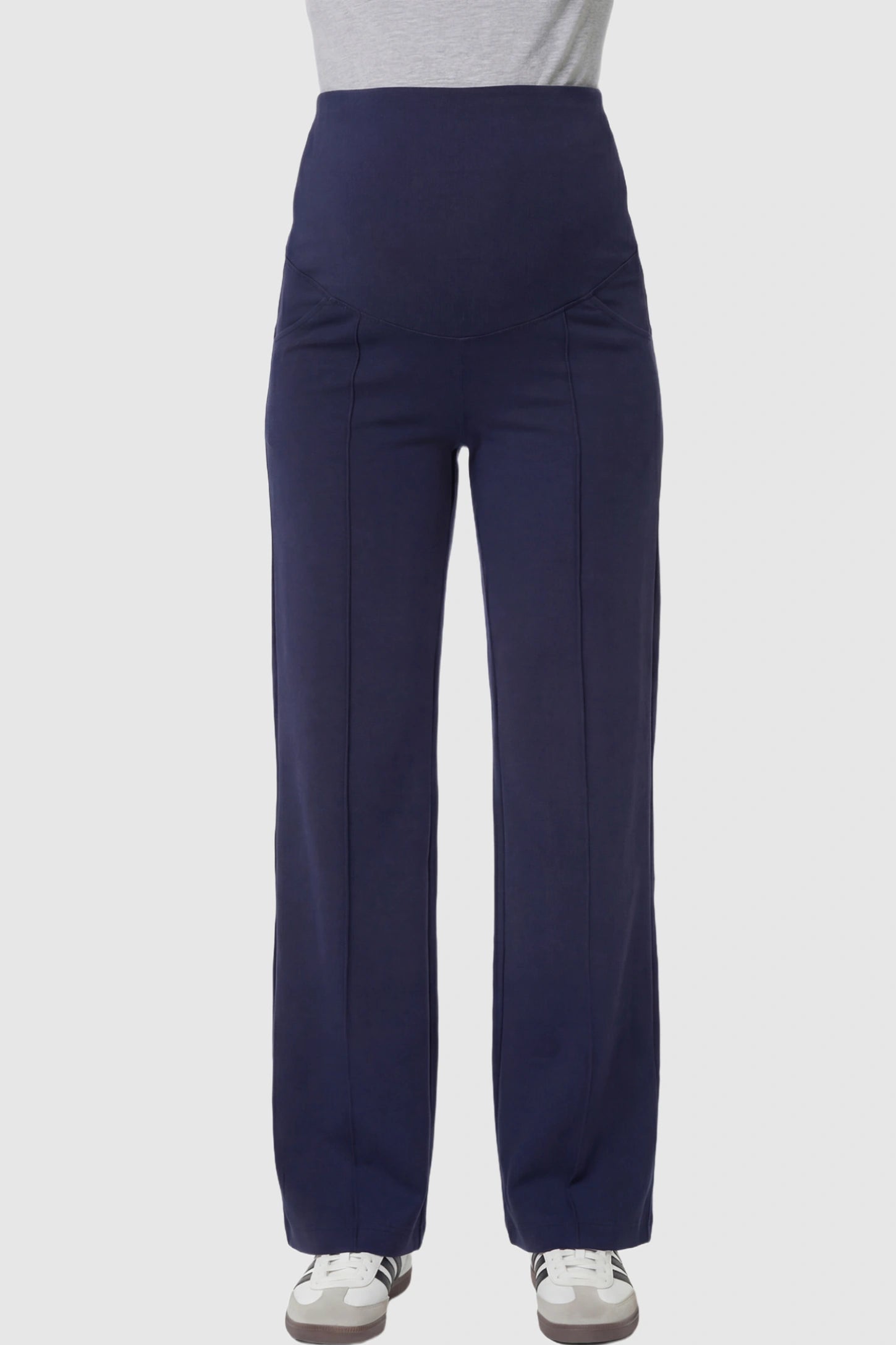 High Stretch Wide Leg Pocketed Maternity Pants High-Stretch Wide Leg Pocketed Maternity Pants in Navy Blue featuring a seamless over-the-bump panel and side pocket on a pregnant model showing front.