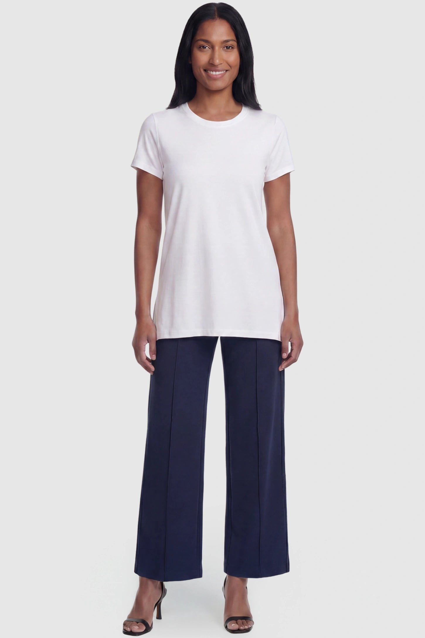 High Stretch Wide Leg Pocketed Maternity Pants High-Stretch Wide Leg Pocketed Maternity Pants in Navy Blue featuring a seamless over-the-bump panel and side pocket on a postpartum model, full body view.