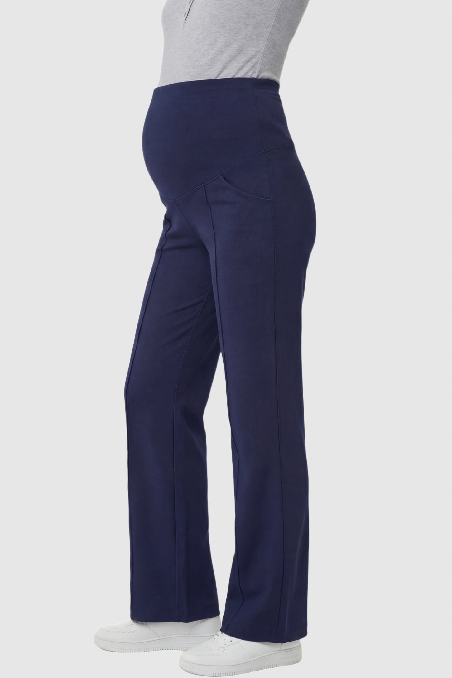 High Stretch Wide Leg Pocketed Maternity Pants High-Stretch Wide Leg Pocketed Maternity Pants in Navy Blue featuring a seamless over-the-bump panel and side pocket on a pregnant model showing side.