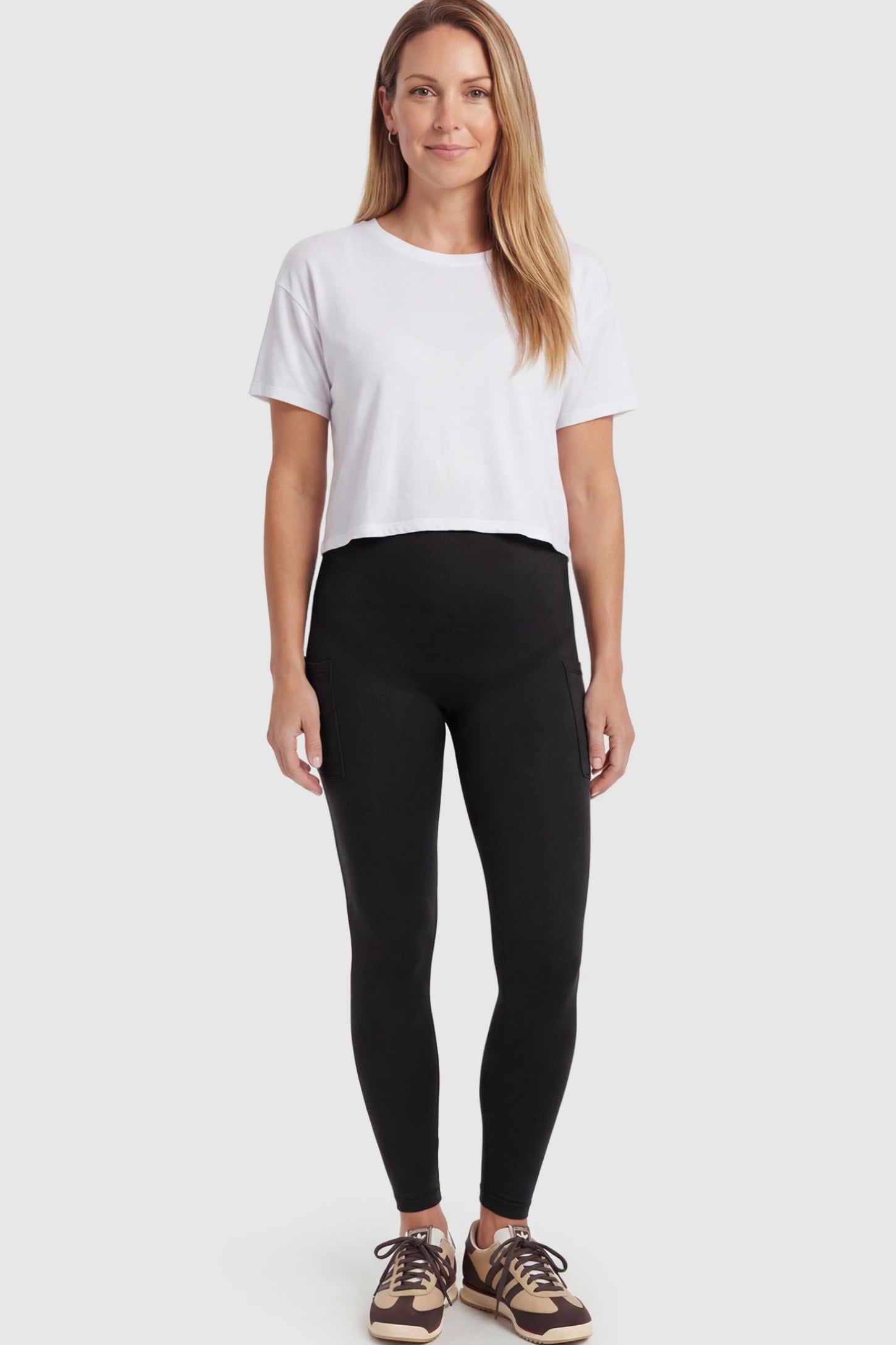 High Waist Ankle Length Pocketed Maternity Leggings High-Waist Ankle-Length Pocketed Maternity Leggings in Black featuring a seamless waistband on a postpartum model showing front.