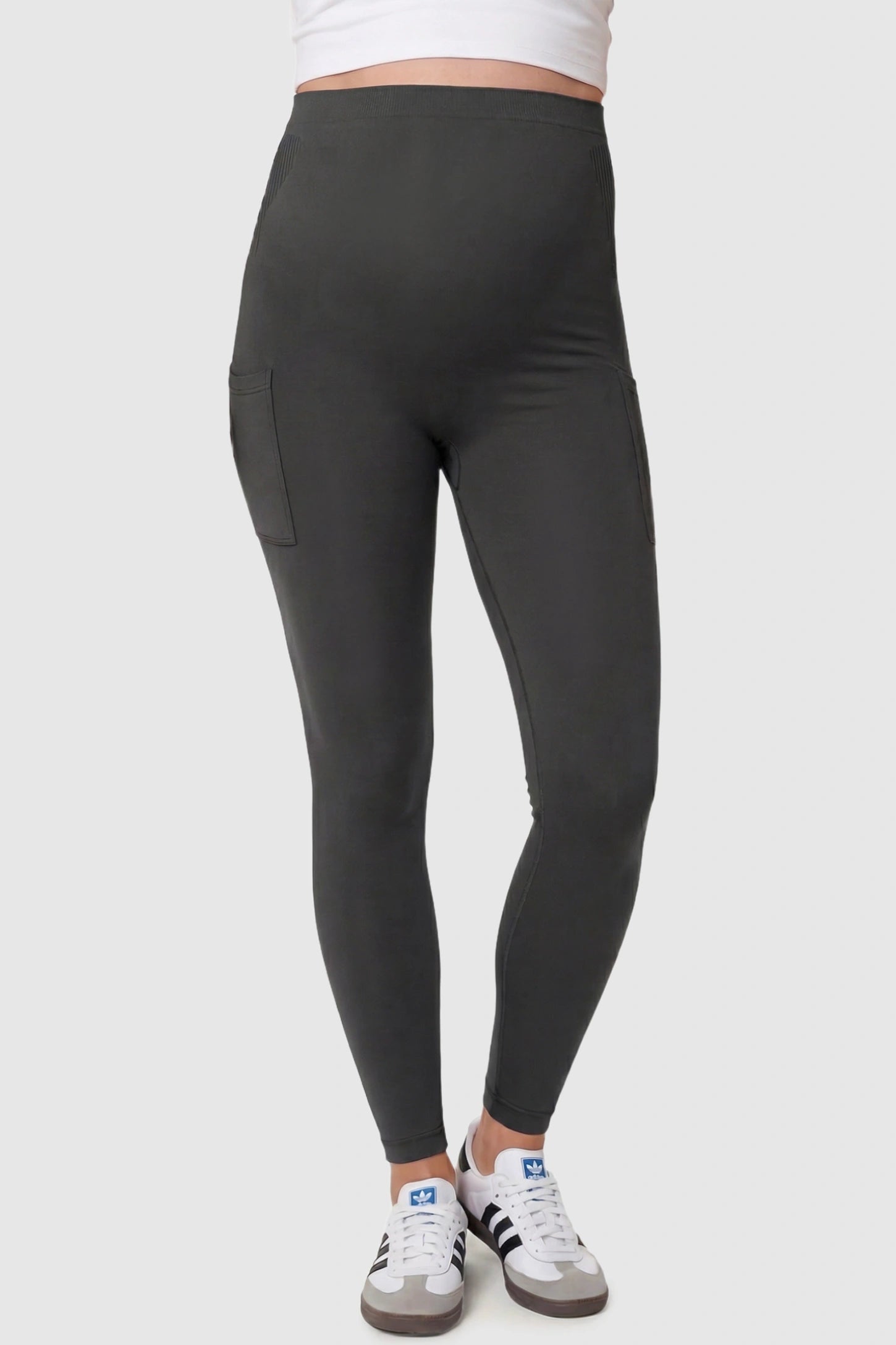 High Waist Ankle Length Pocketed Maternity Leggings High-Waist Ankle-Length Pocketed Maternity Leggings in Gray featuring a seamless waistband on a pregnant model, front view.