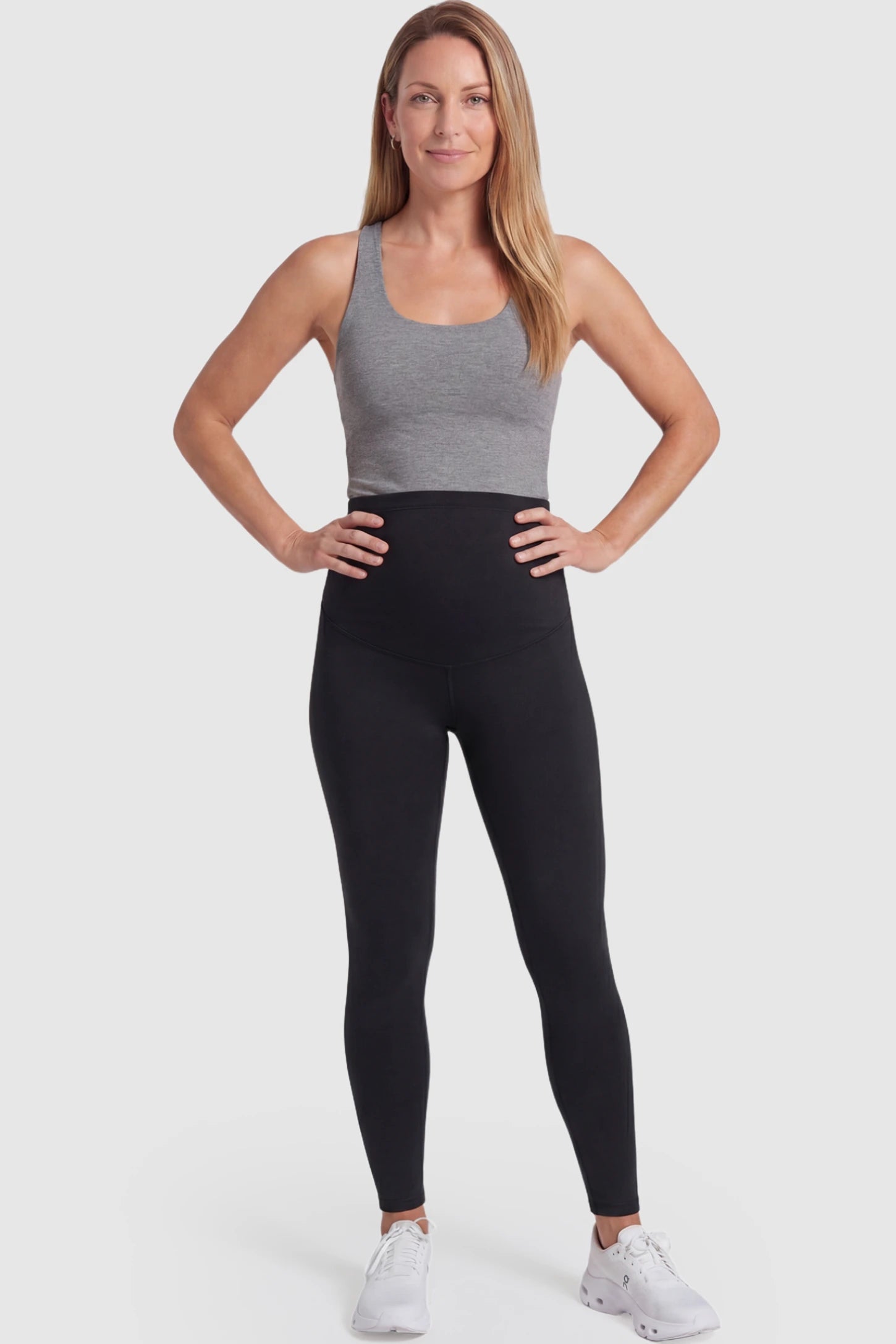 High Waist Belly Support Full Length Maternity Leggings High Waist Belly Support Full Length Maternity Leggings in Black featuring molding waistband on a postpartum model posing front.