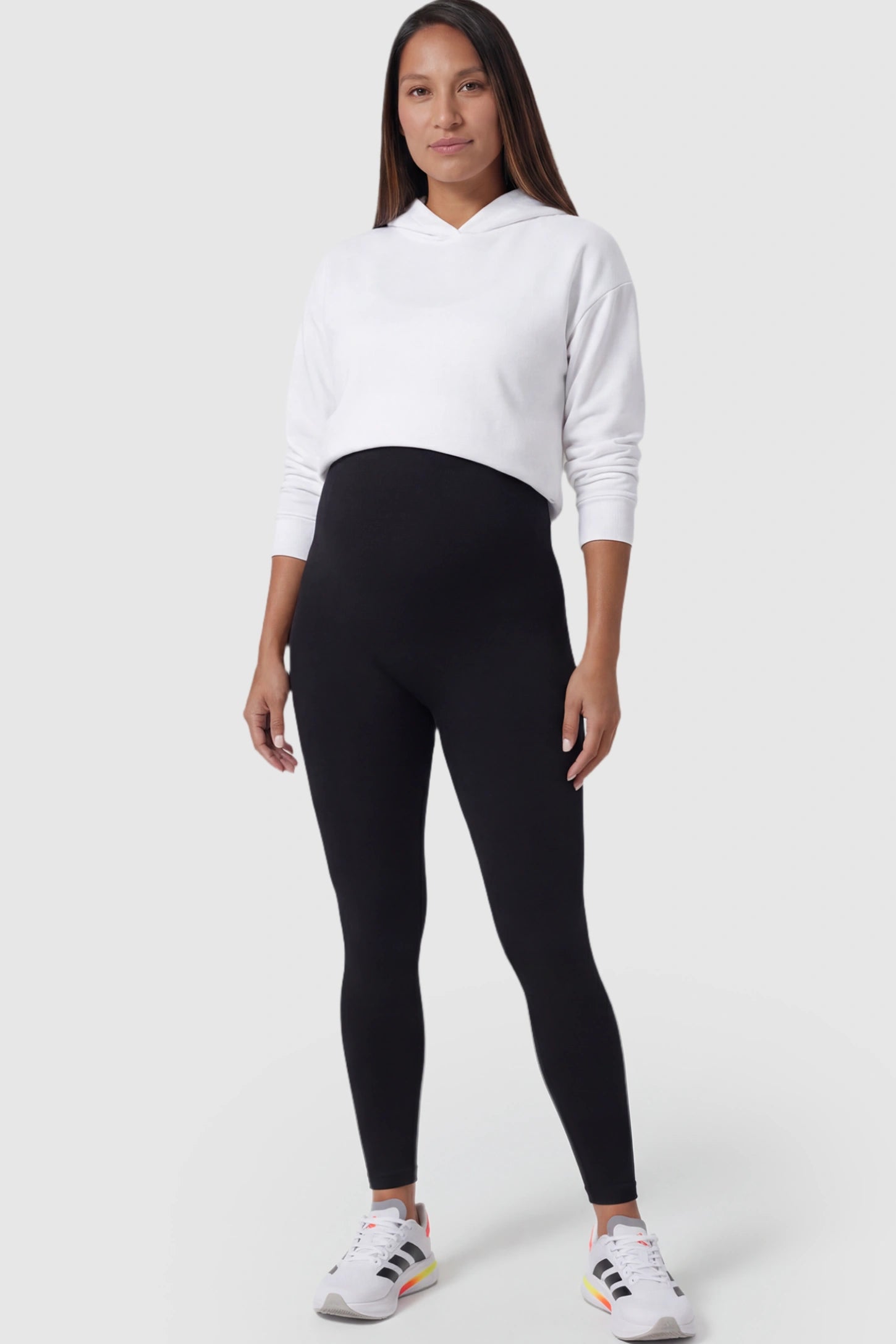 High Waist Full Length Maternity Leggings High Waist Seamless Full-Length Maternity Leggings in Black featuring a supportive waistband on a postpartum  model showing front.
